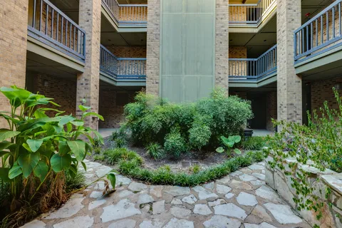 a view of a street from a balcony