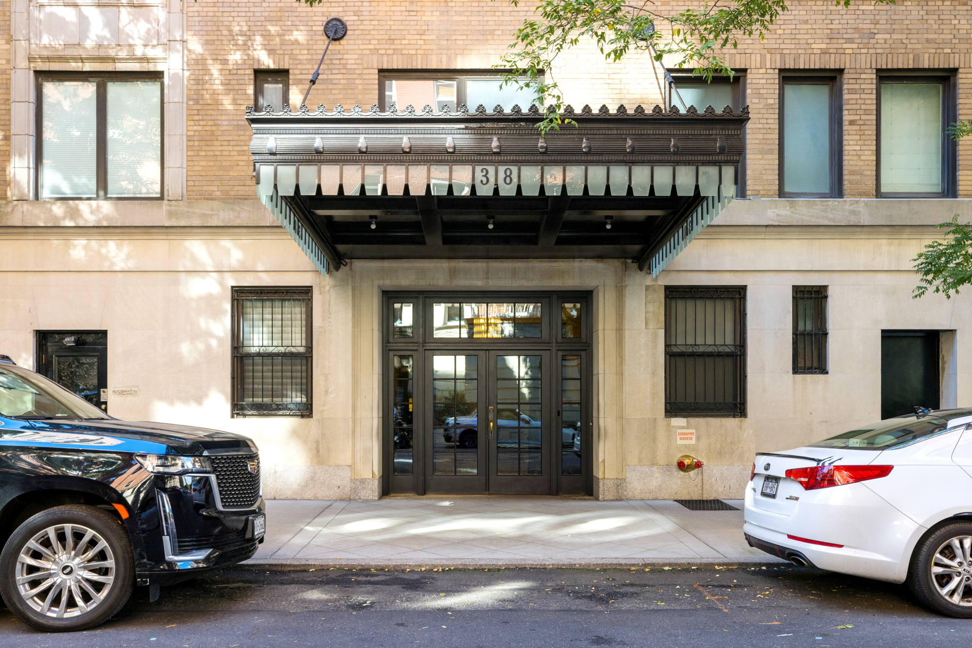 38 East 85th Street, Unit 10E Manhattan, NY 10028 - Photo 13 of 14 a view of a car park in front of building