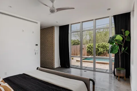 a living room with furniture and flowers