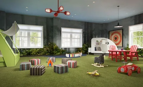 a living room with furniture toys and a large window