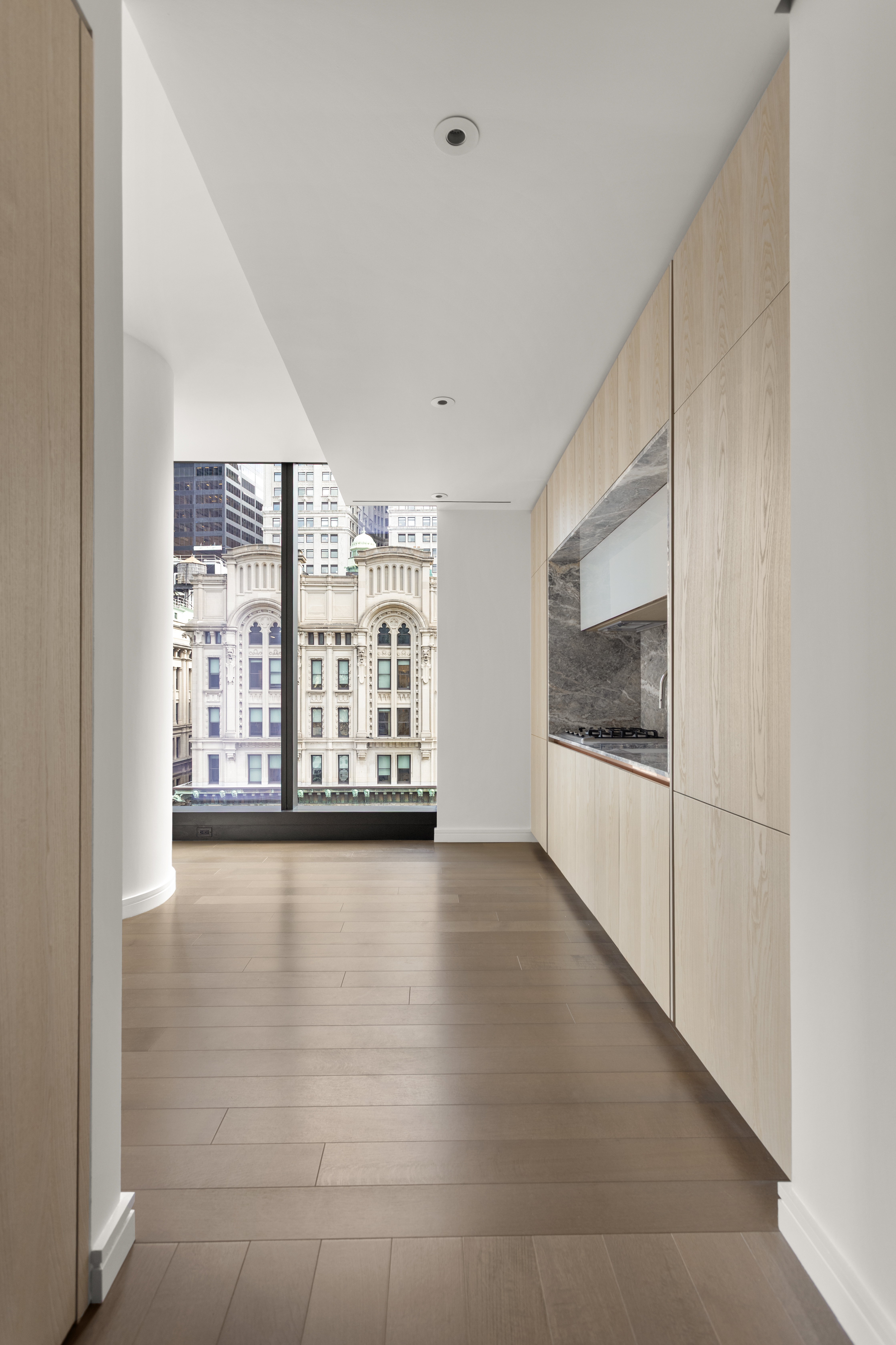125 Greenwich Street, Unit 31A Manhattan, NY 10006 - Photo 16 of 23 a view of a large window in an empty room