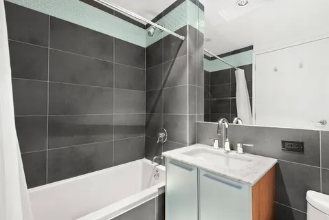 a bathroom with a sink and a bathtub
