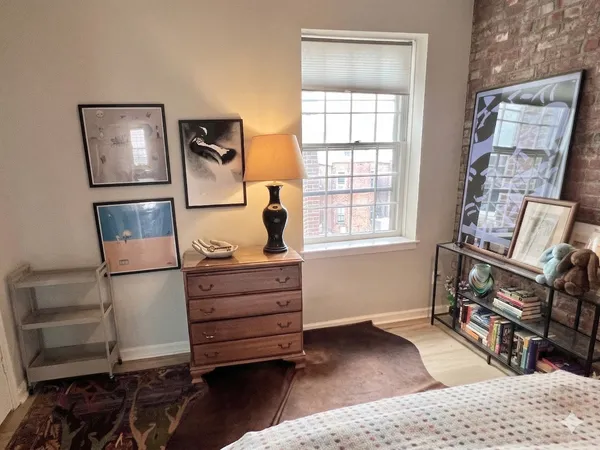 a room with furniture and a window