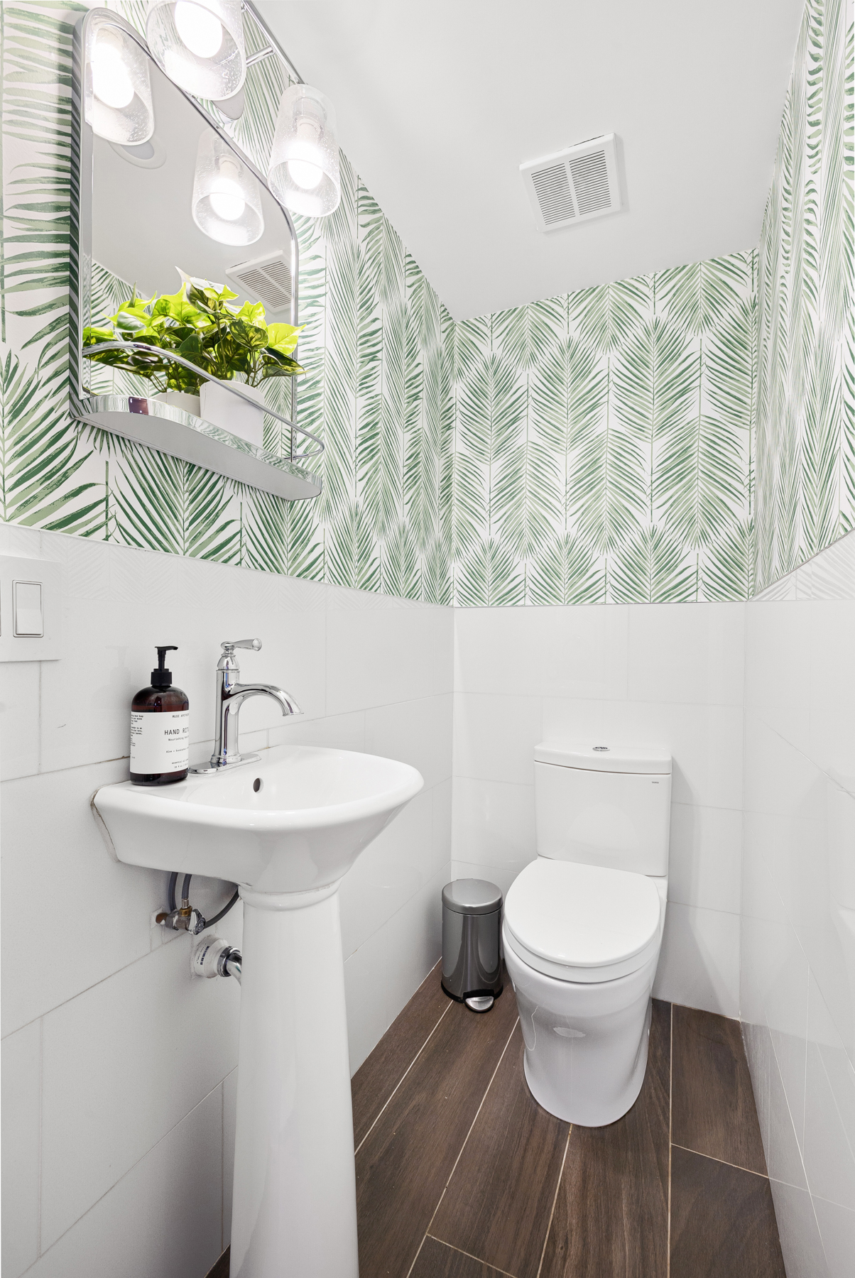 202 22nd Street Brooklyn, NY 11232 - Photo 9 of 28 a bathroom with a sink and a toilet