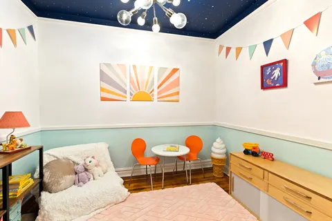 a bed room with a bed and a couch