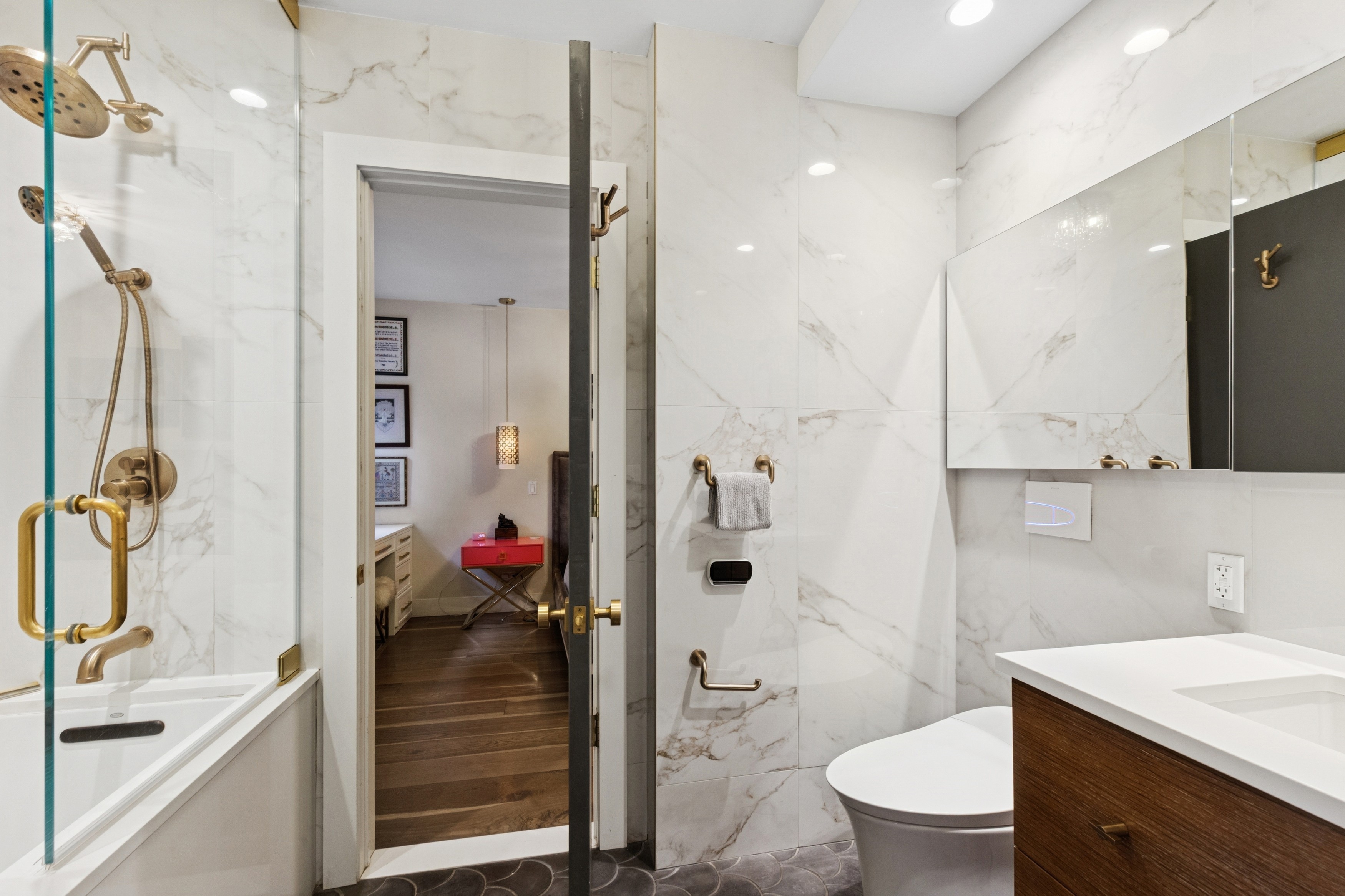 125 Cabrini Boulevard, Unit A22 Manhattan, NY 10033 - Photo 11 of 20 a bathroom with a sink toilet and shower