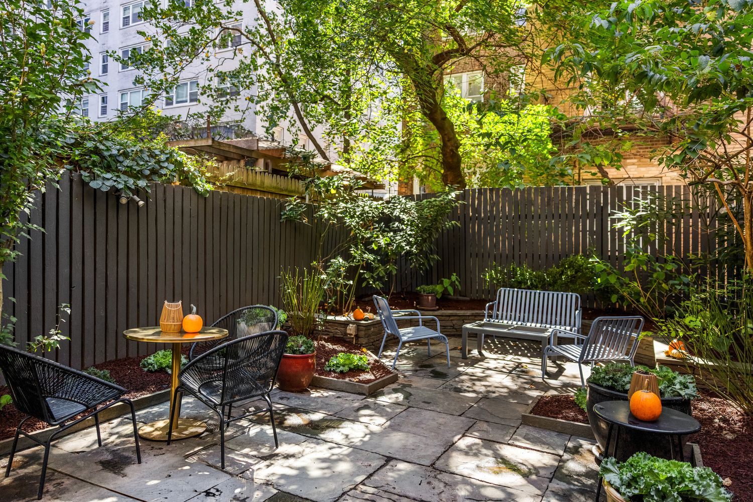 a spacious bedroom with a bed and large windows