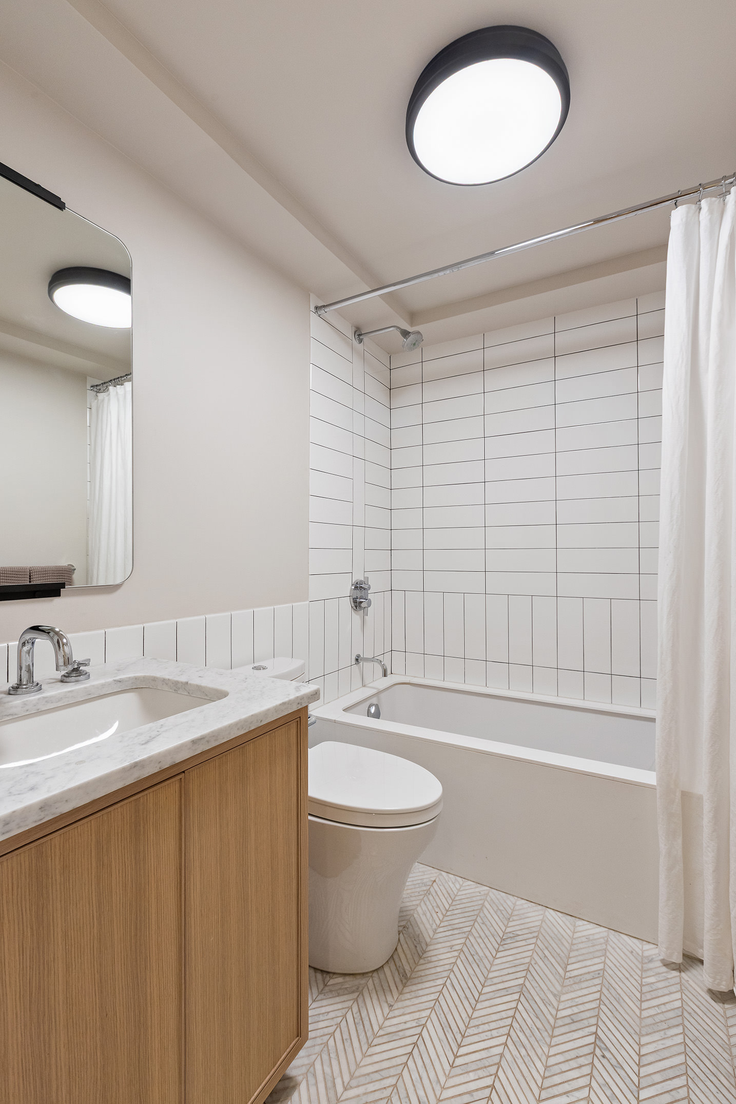 479 Henry Street Brooklyn, NY 11231 - Photo 25 of 30 a bathroom with a sink a toilet and a mirror