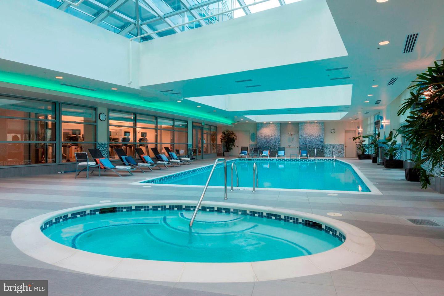 1881 North Nash Street, Unit 1009 Arlington, VA 22209 - Photo 19 of 36 an outdoor space with swimming pool and furniture