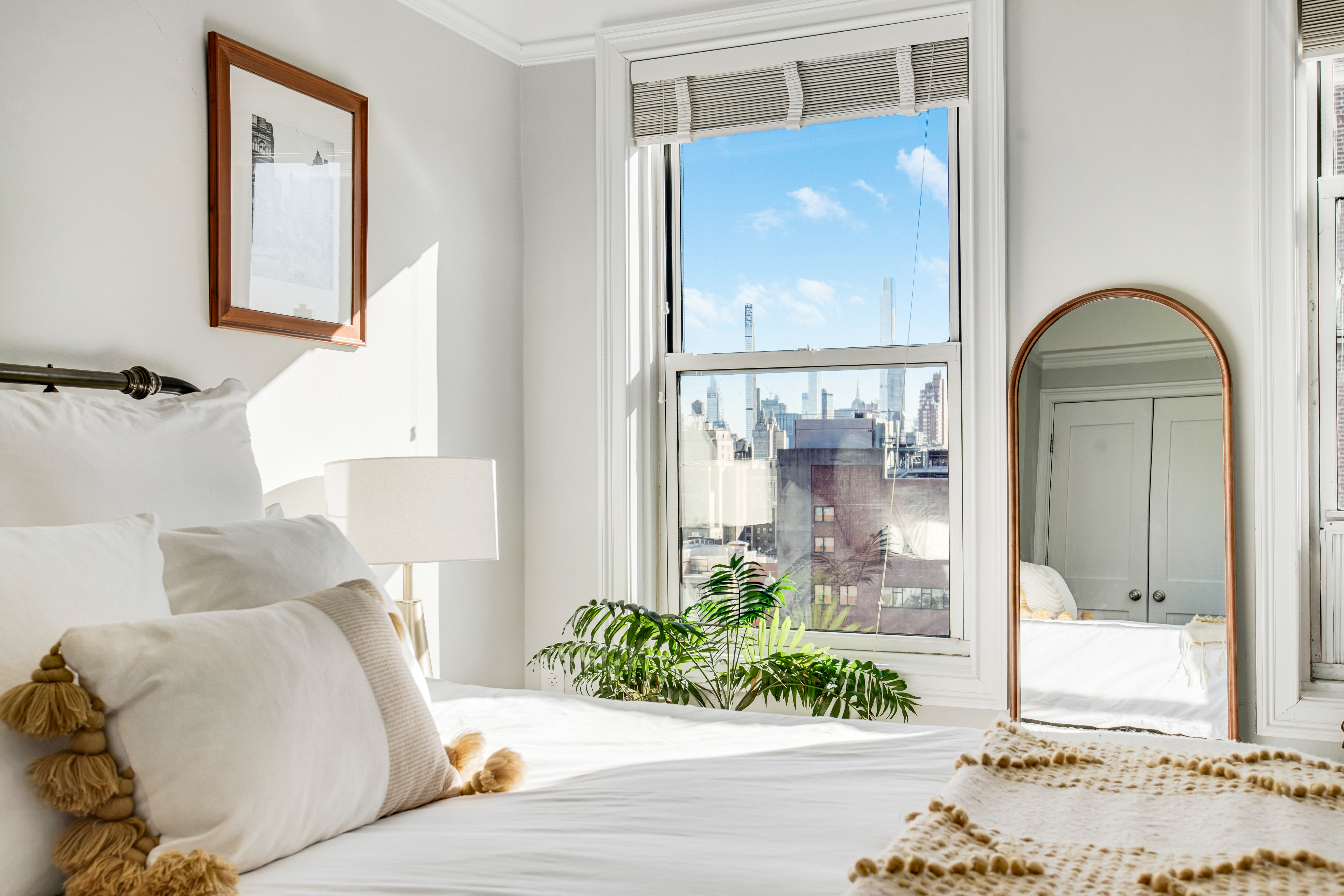 165 West 91st Street, Unit 15B Manhattan, NY 10024 - Photo 9 of 24 a living room with furniture and a potted plant