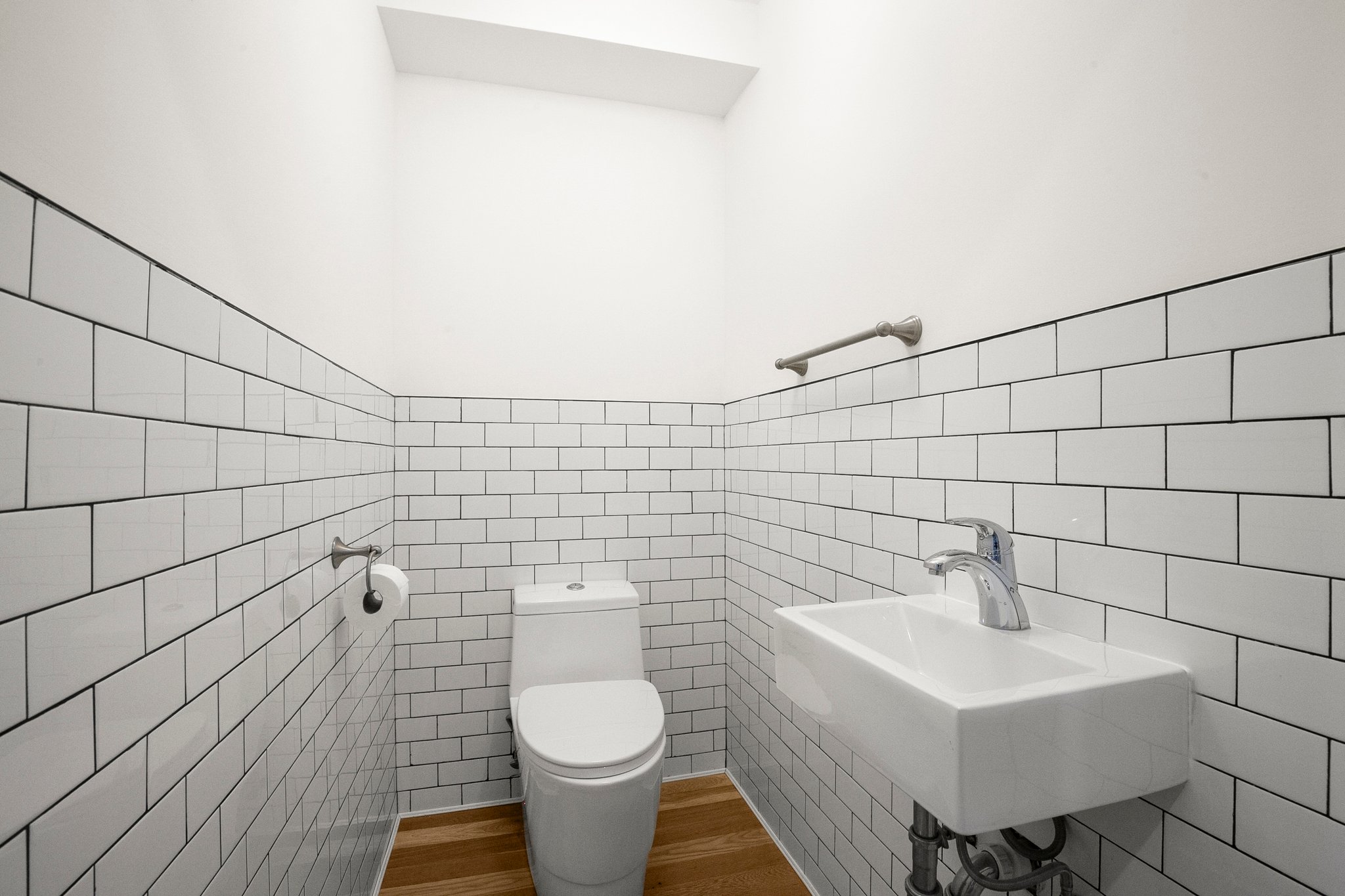 1130 Decatur Street Brooklyn, NY 11207 - Photo 16 of 24 a bathroom with a sink toilet and a mirror