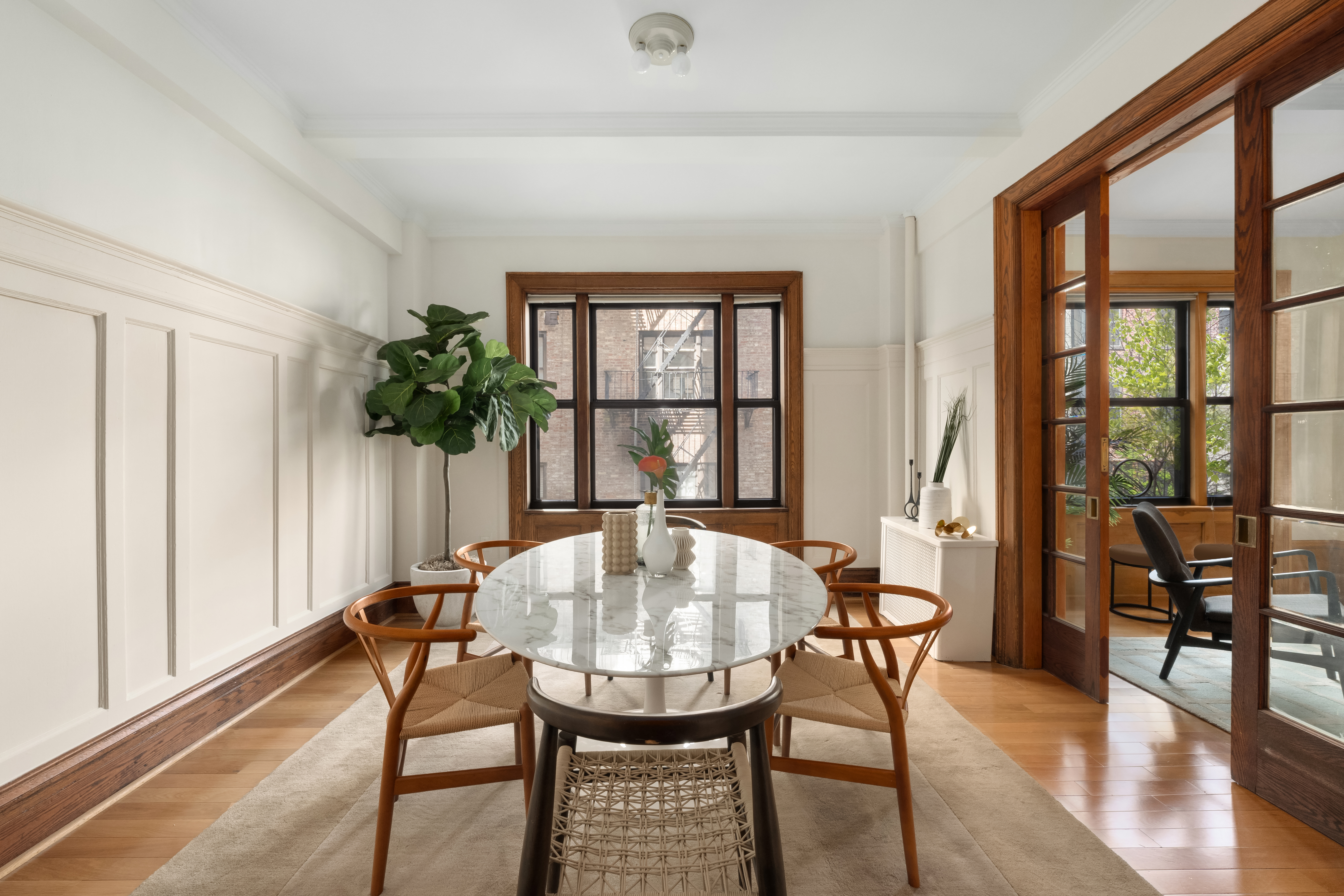 35 West 82nd Street, Unit 4C Manhattan, NY 10024 - Photo 3 of 11 a view of a dining room with furniture and window
