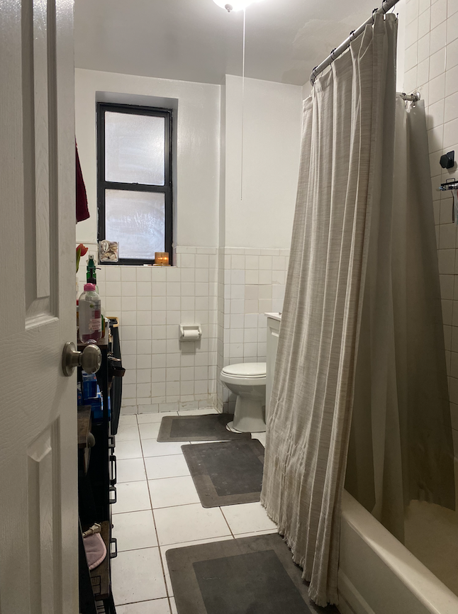 470 West 166th Street, Unit 21 Manhattan, NY 10032 - Photo 8 of 8 a bathroom with a sink and a mirror