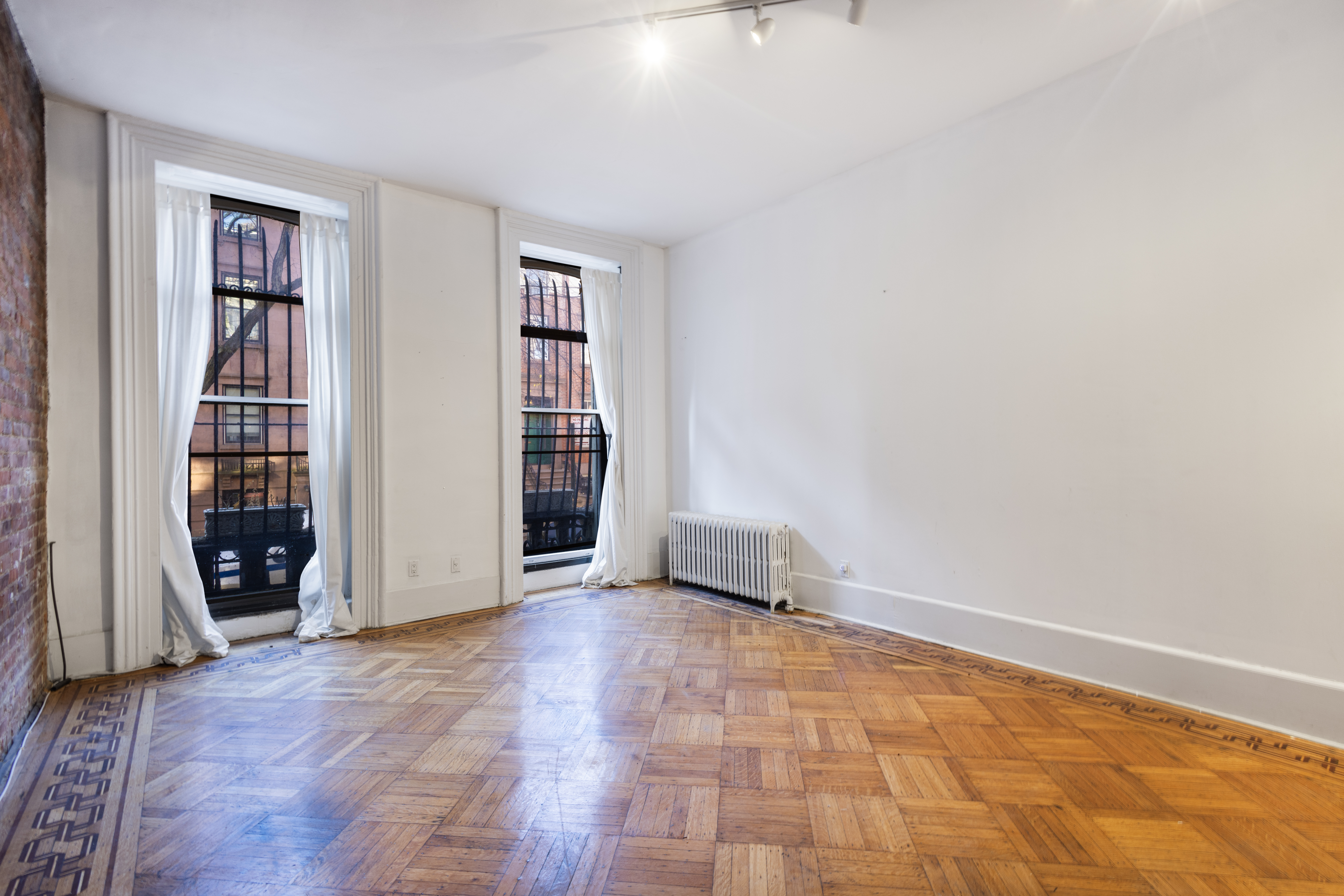 145 State Street, Unit 1 Brooklyn, NY 11201 - Photo 3 of 12 an empty room with closet