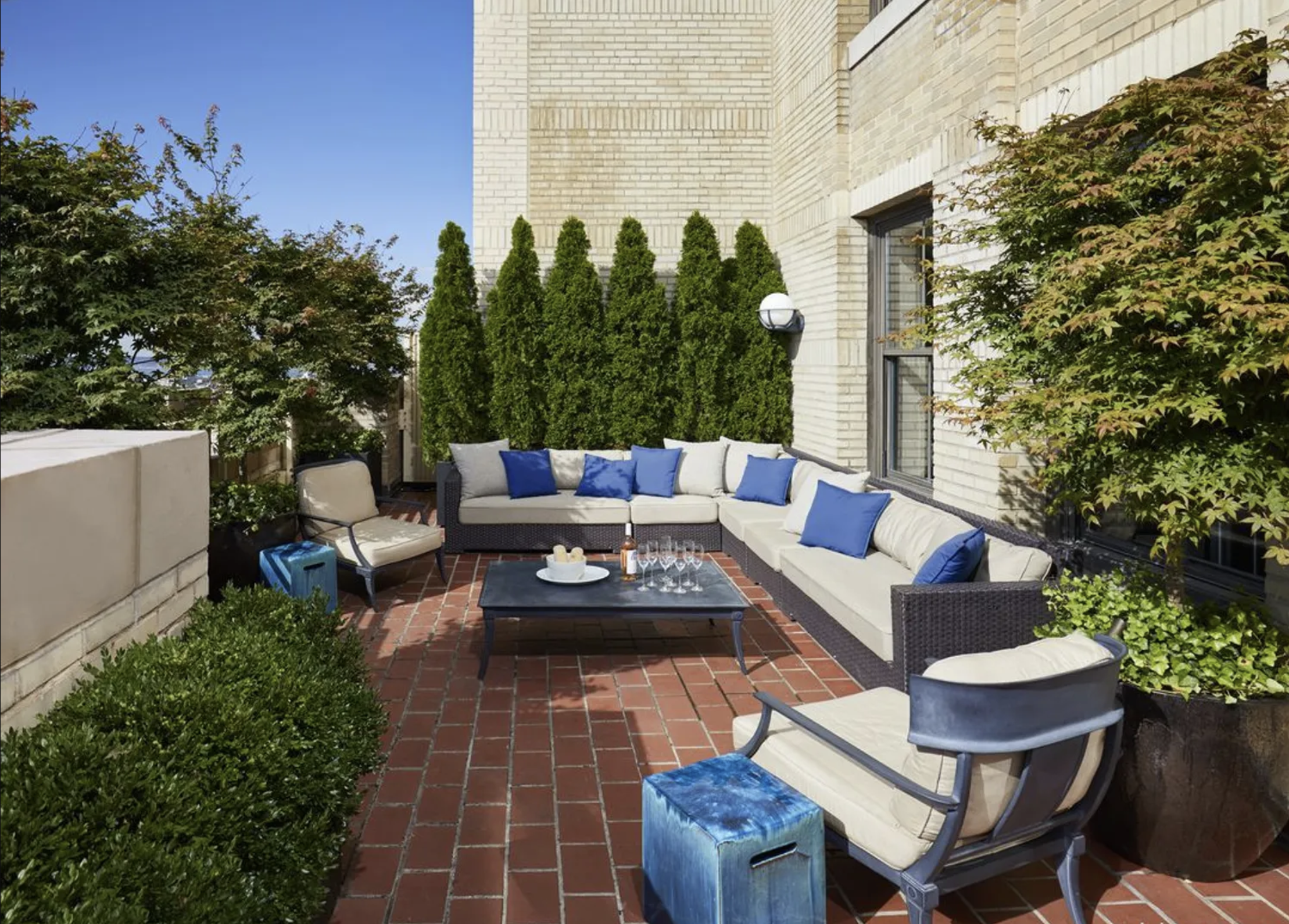 1 Hanson Place, Unit 10H Brooklyn, NY 11243 - Photo 8 of 13 a view of a patio with couches table and chairs and potted plants