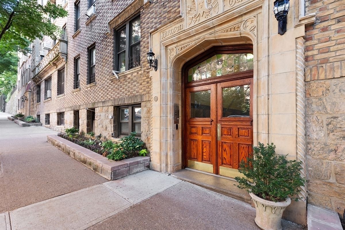 125 Cabrini Boulevard, Unit A22 Manhattan, NY 10033 - Photo 16 of 20 a view of a house with potted plants