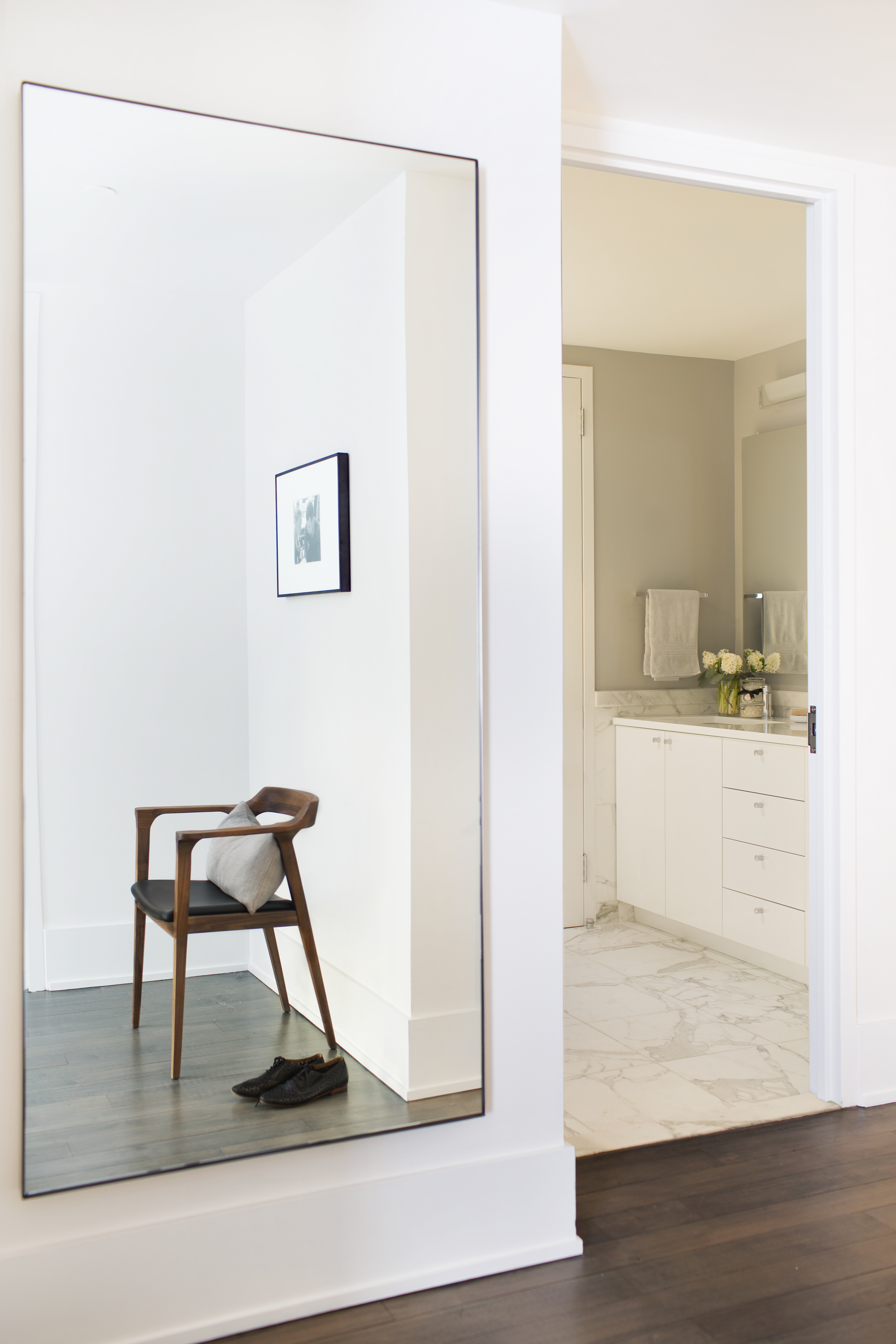 224 West 18th Street, Unit 6C Manhattan, NY 10011 - Photo 9 of 21 a view of a room that has a bench and a table in it