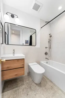 a bathroom with a sink and a bathtub