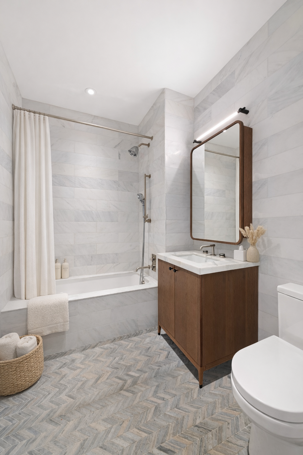 180 Front Street, Unit 12H Brooklyn, NY 11201 - Photo 5 of 20 a bathroom with a sink toilet and tub