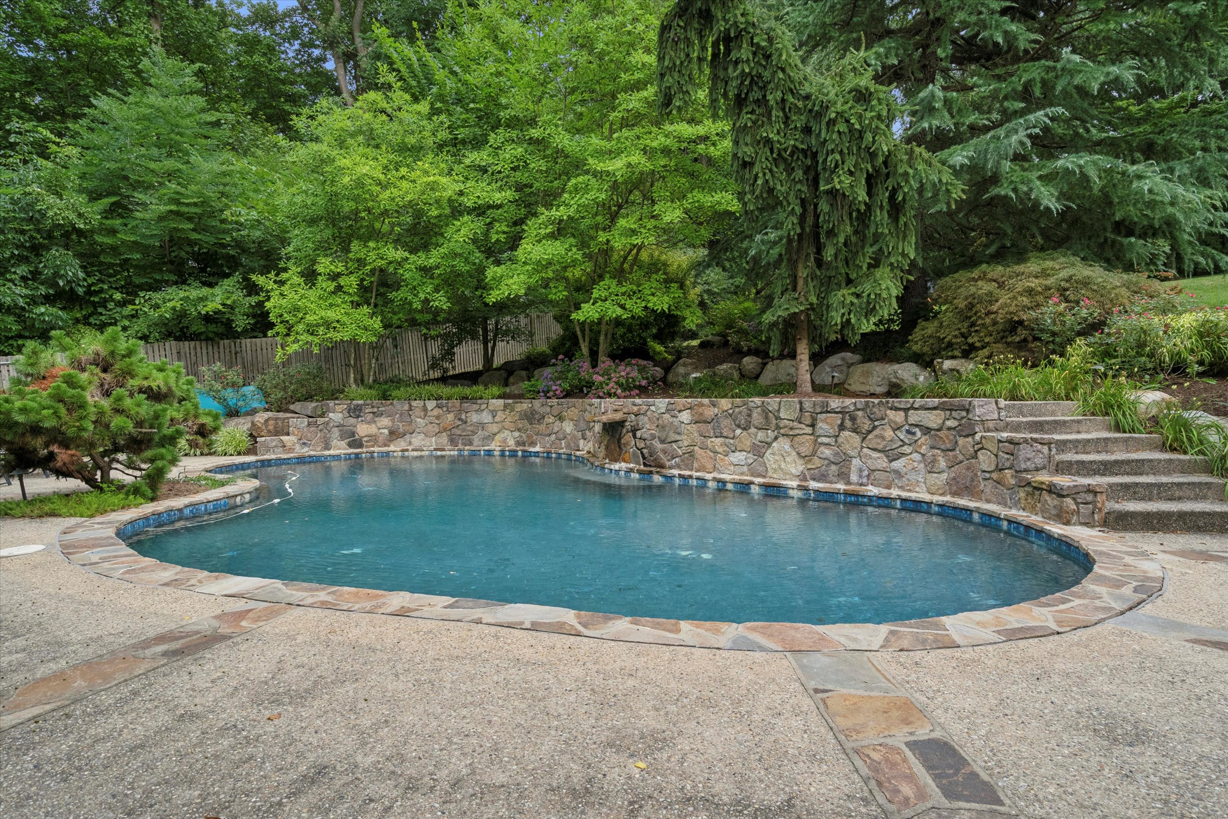 145 Biddulph Road Wayne, PA 19087 - Photo 35 of 39 a view of a swimming pool with a yard