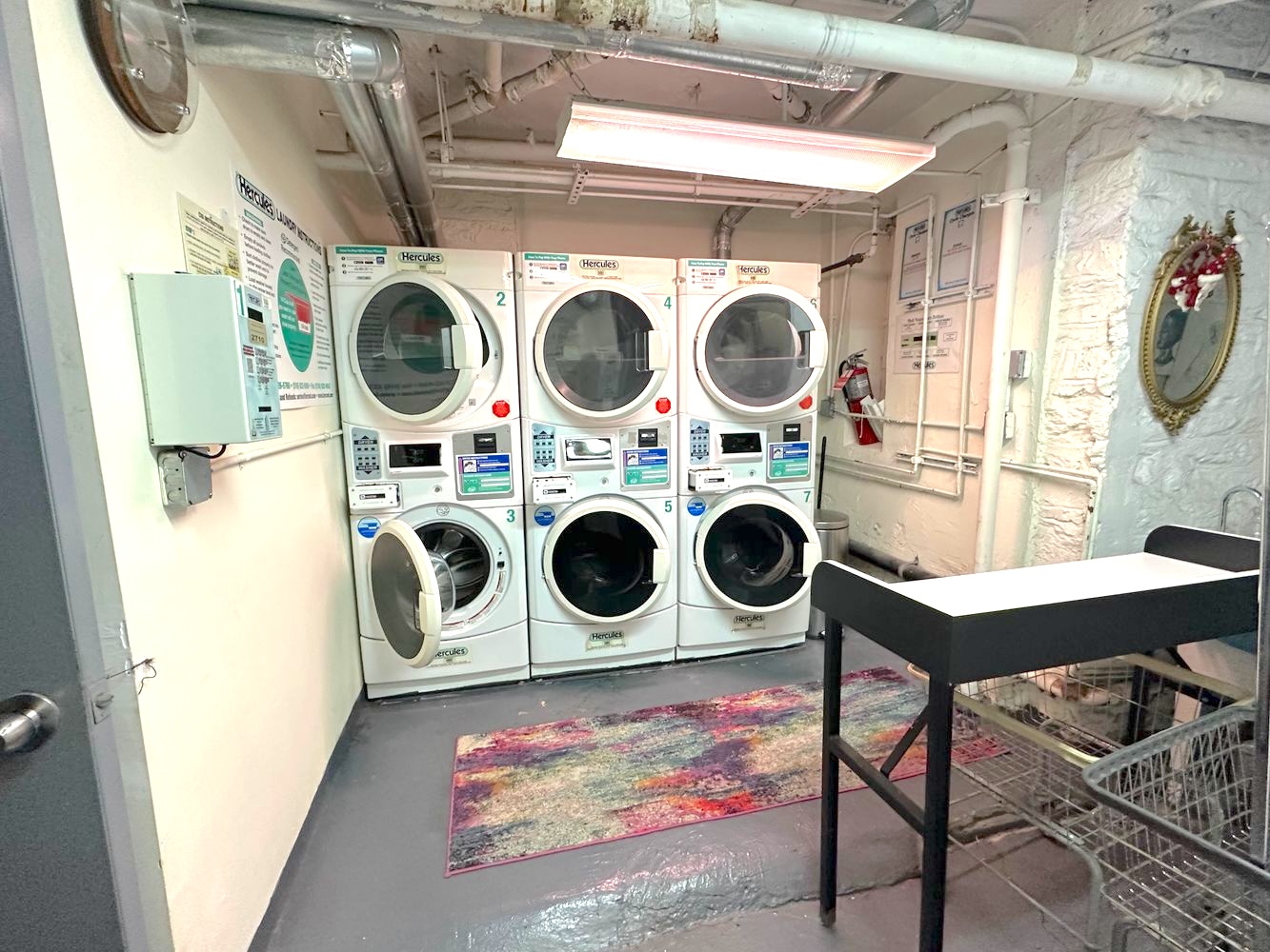245 West 115th Street, Unit 16 Manhattan, NY 10026 - Photo 8 of 10 a utility room with dryer and washer