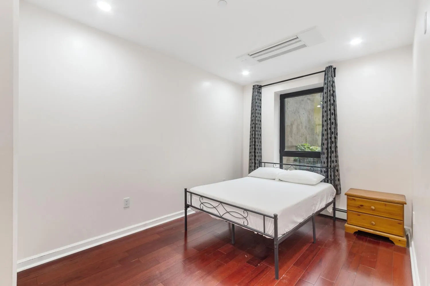 a room with furniture and wooden floor