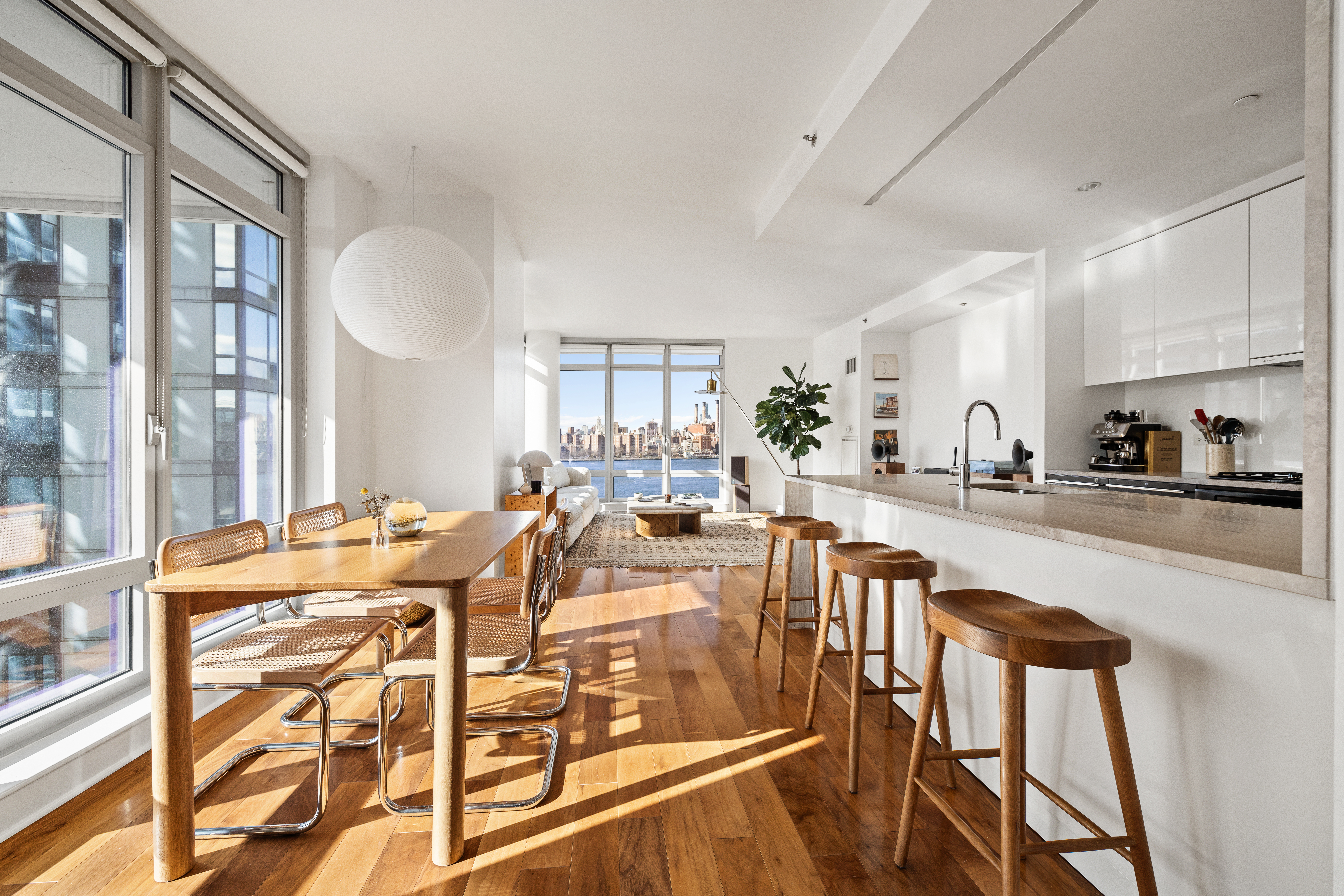 2 Northside Piers, Unit 8A Brooklyn, NY 11249 - Photo 3 of 11 a view of a dining room and livingroom view