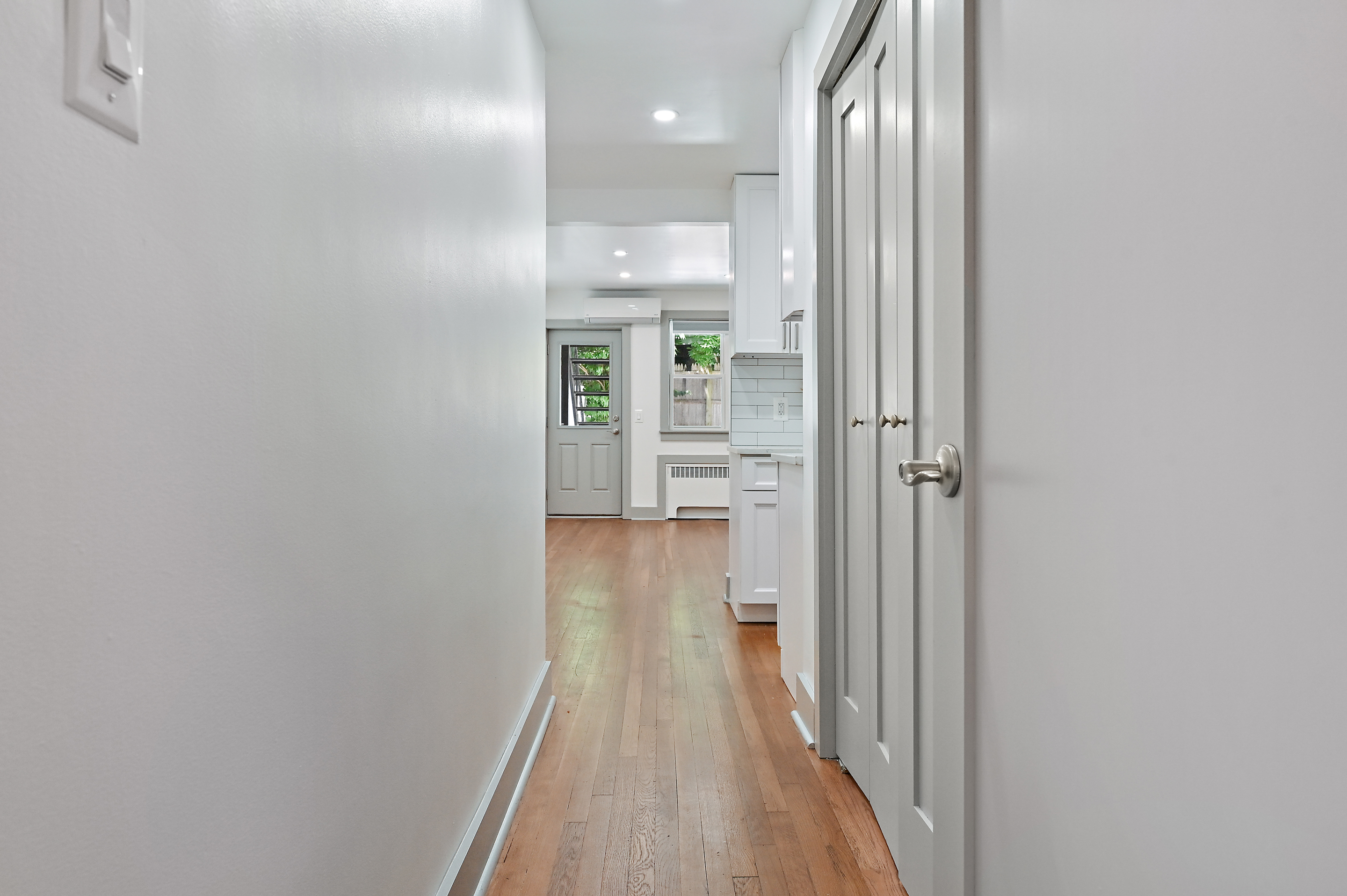5823 Fieldston Road, Unit 1A Bronx, NY 10471 - Photo 21 of 26 a view of a hallway with wooden floor