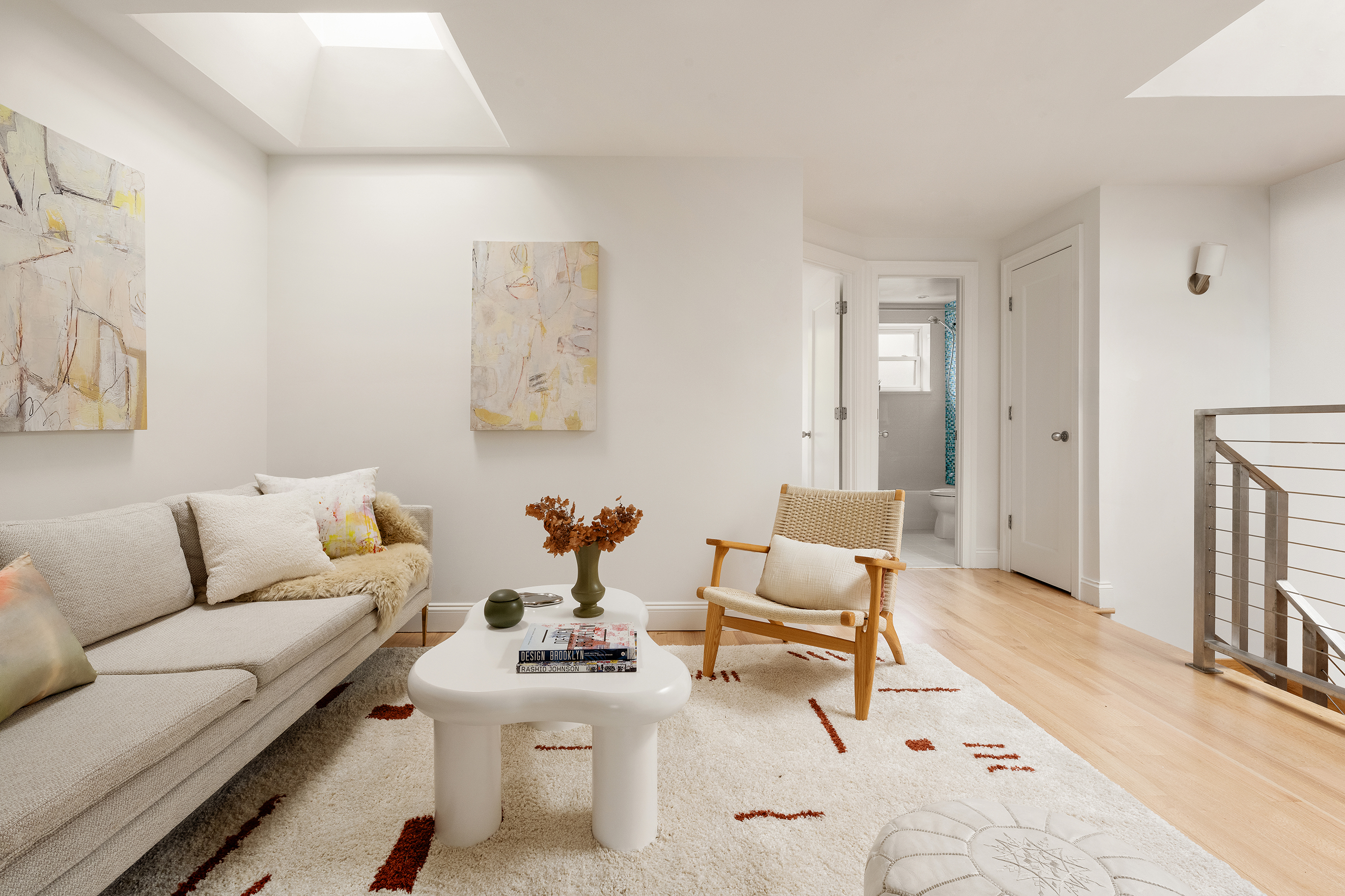 221 Prospect Place Brooklyn, NY 11238 - Photo 11 of 16 a living room with furniture and a wooden floor