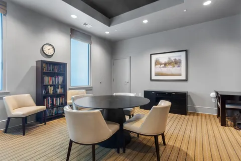 a view of a house with a snow in the background