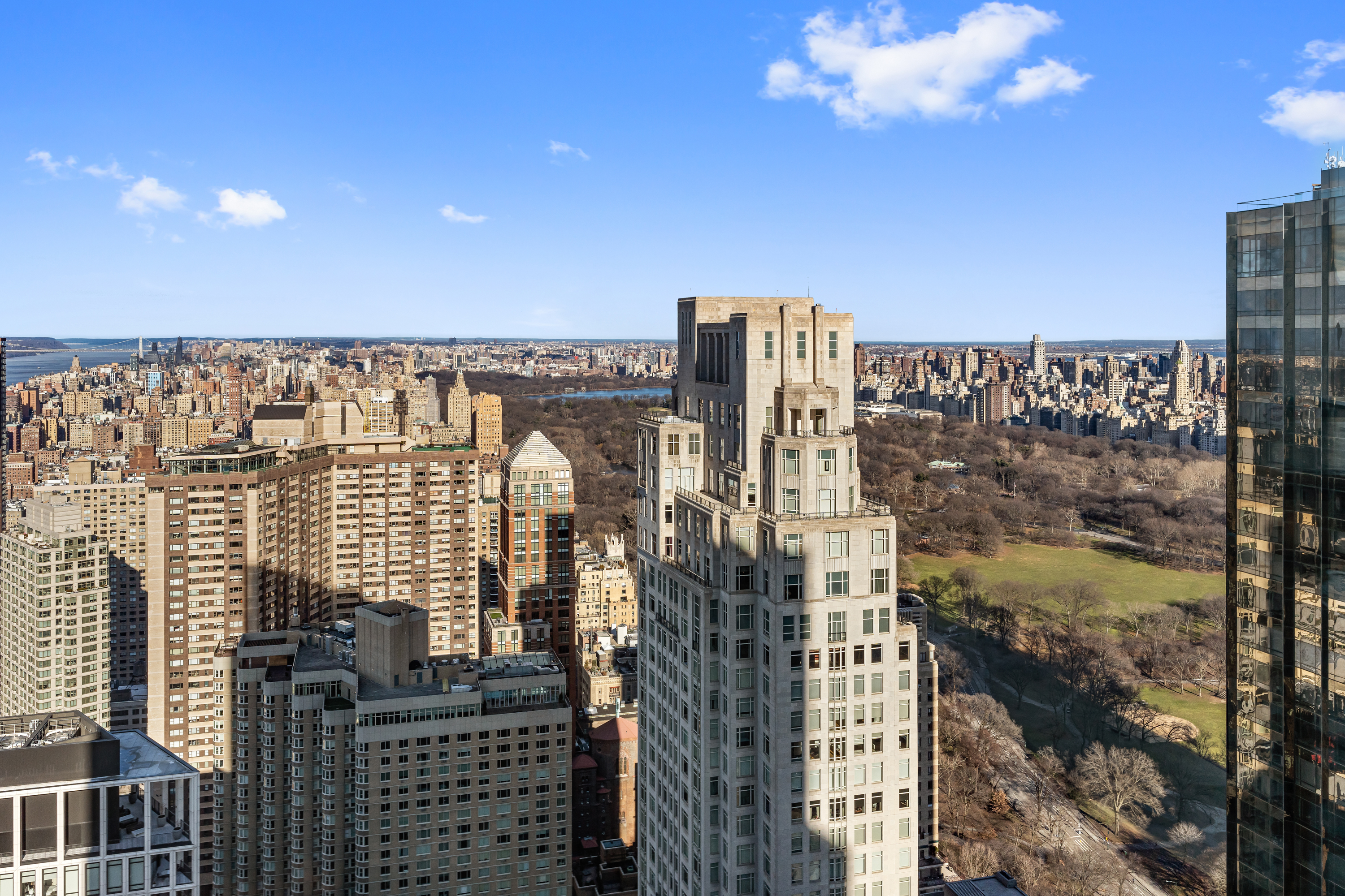 80 Columbus Circle, Unit 67B Manhattan, NY 10019 - Photo 14 of 16 a view of a city with tall buildings