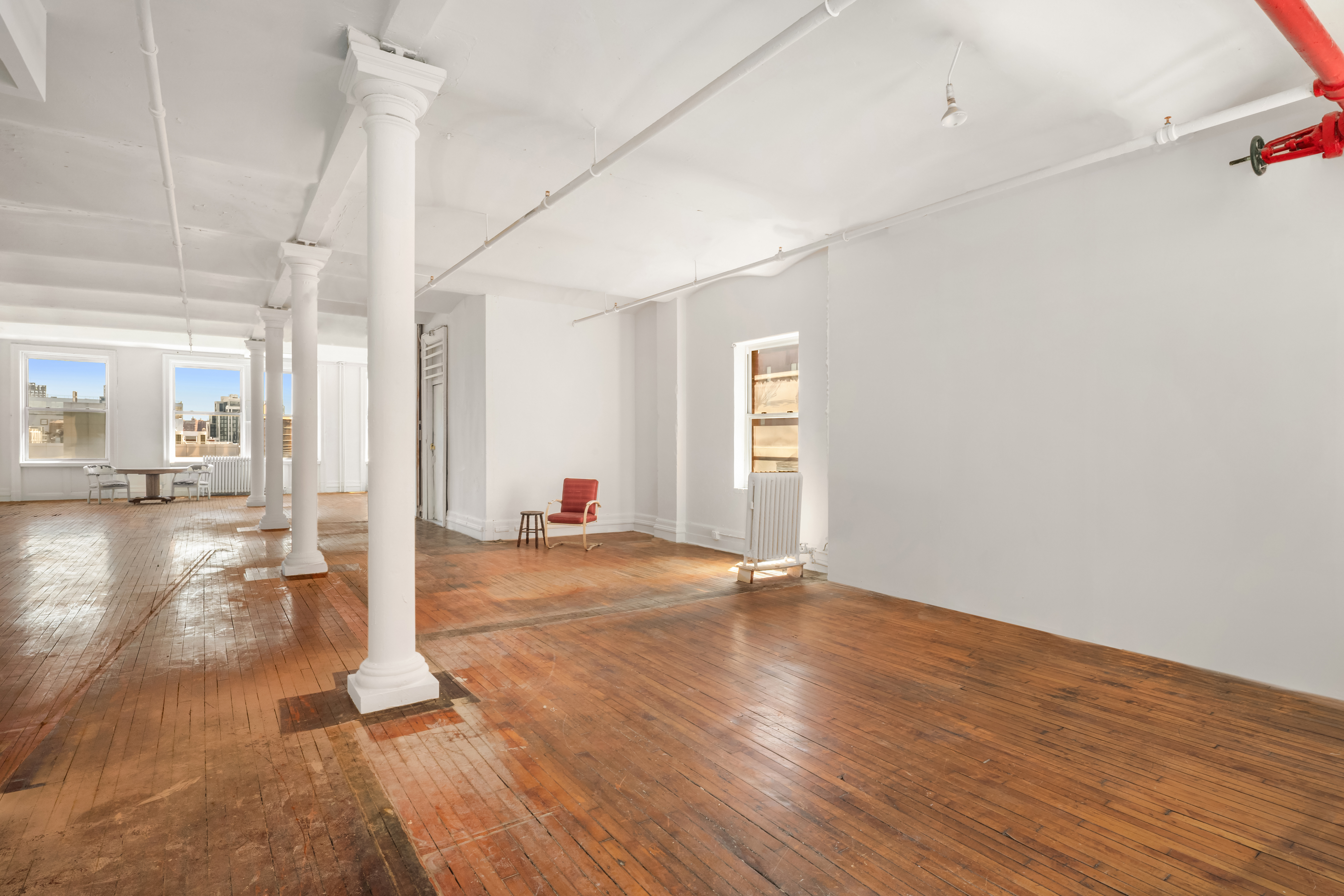 491 Broadway Manhattan, NY 10012 - Photo 5 of 11 a view of a room with wooden floor