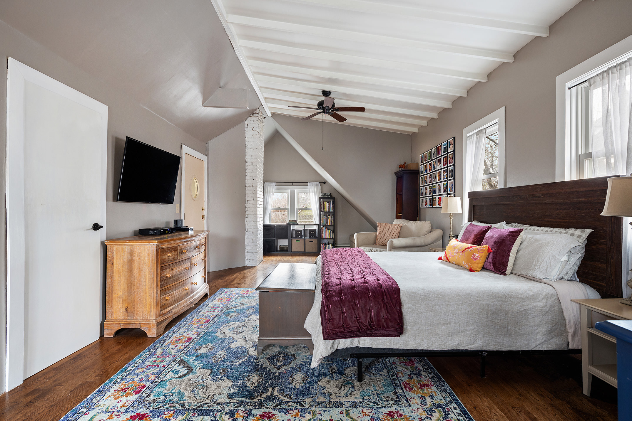 267 Marlborough Road Brooklyn, NY 11226 - Photo 8 of 14 a bedroom with a bed and flat screen tv