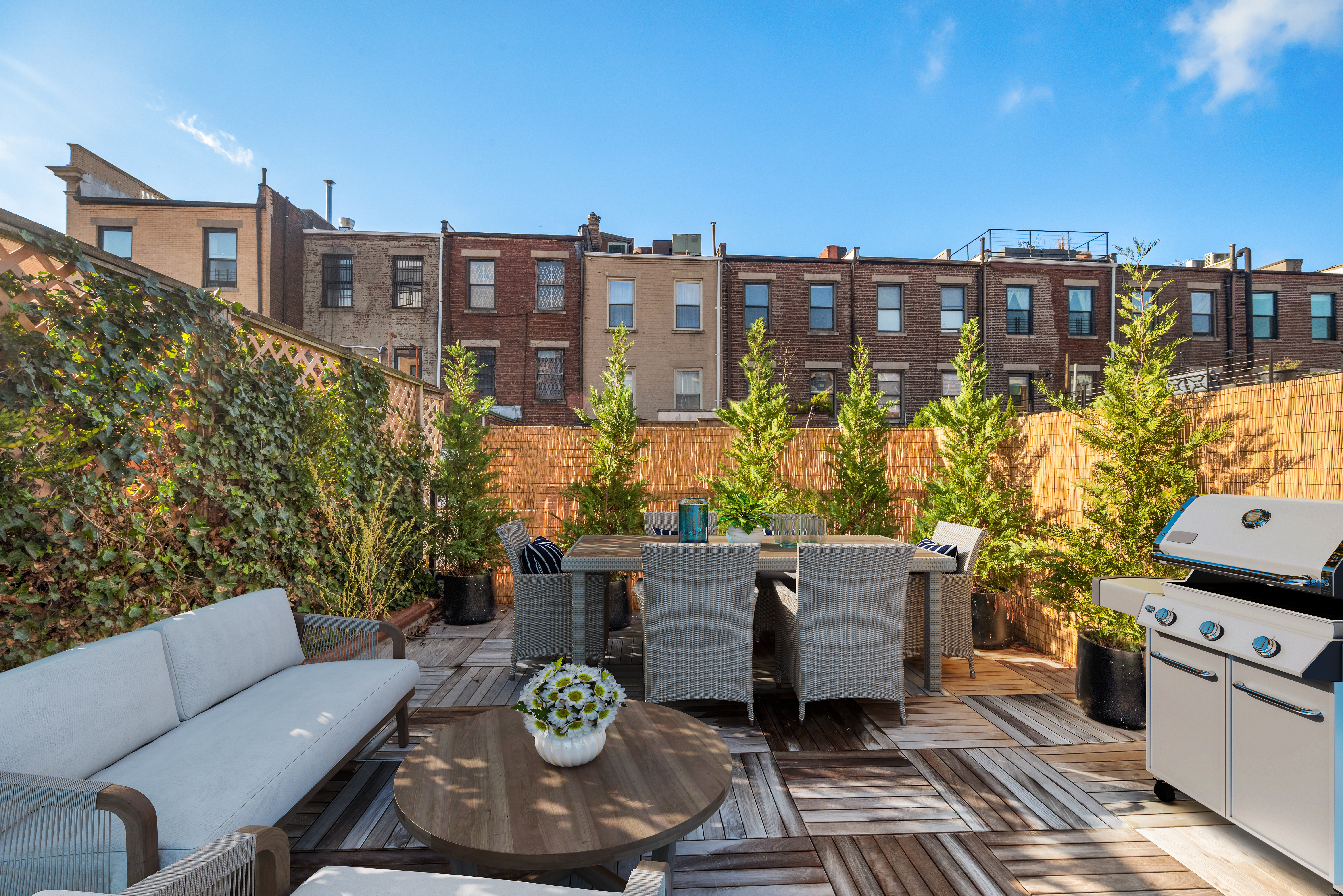 226 West 139th Street Boston, NY 10030 - Photo 6 of 14 a view of a terrace with furniture and a potted plant
