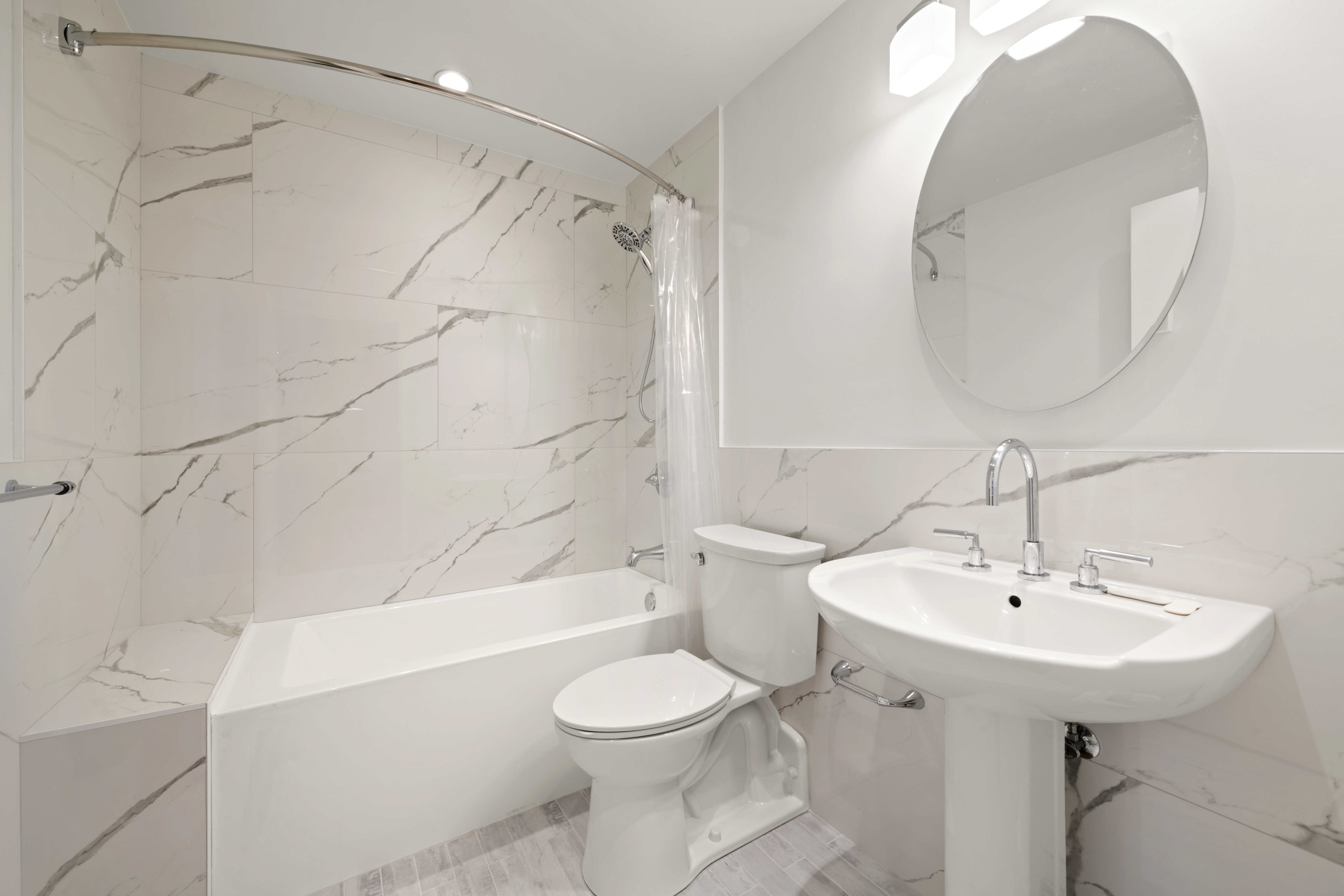 176 Broadway, Unit 9F Manhattan, NY 10038 - Photo 8 of 9 a bathroom with a sink toilet and shower