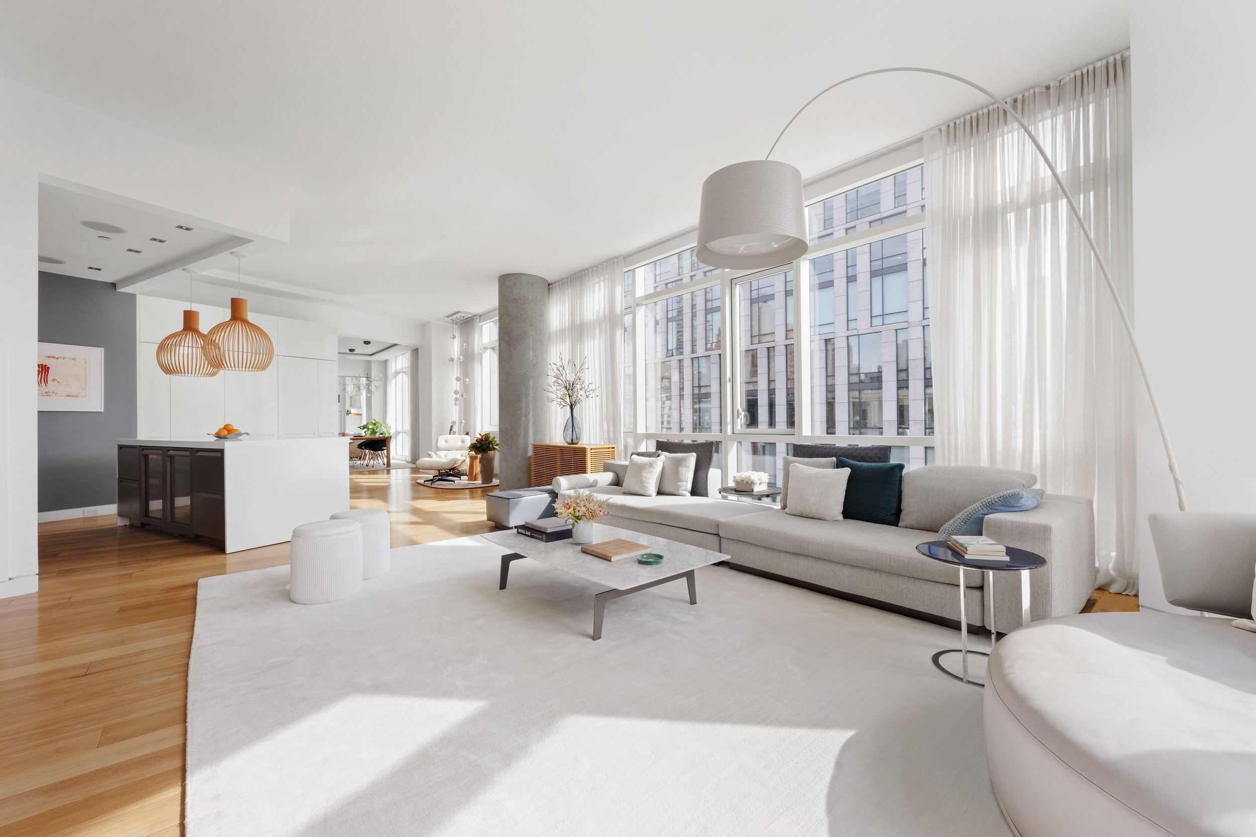 200 Chambers Street, Unit 7AI Manhattan, NY 10007 - Photo 3 of 28 a living room with furniture and a large window