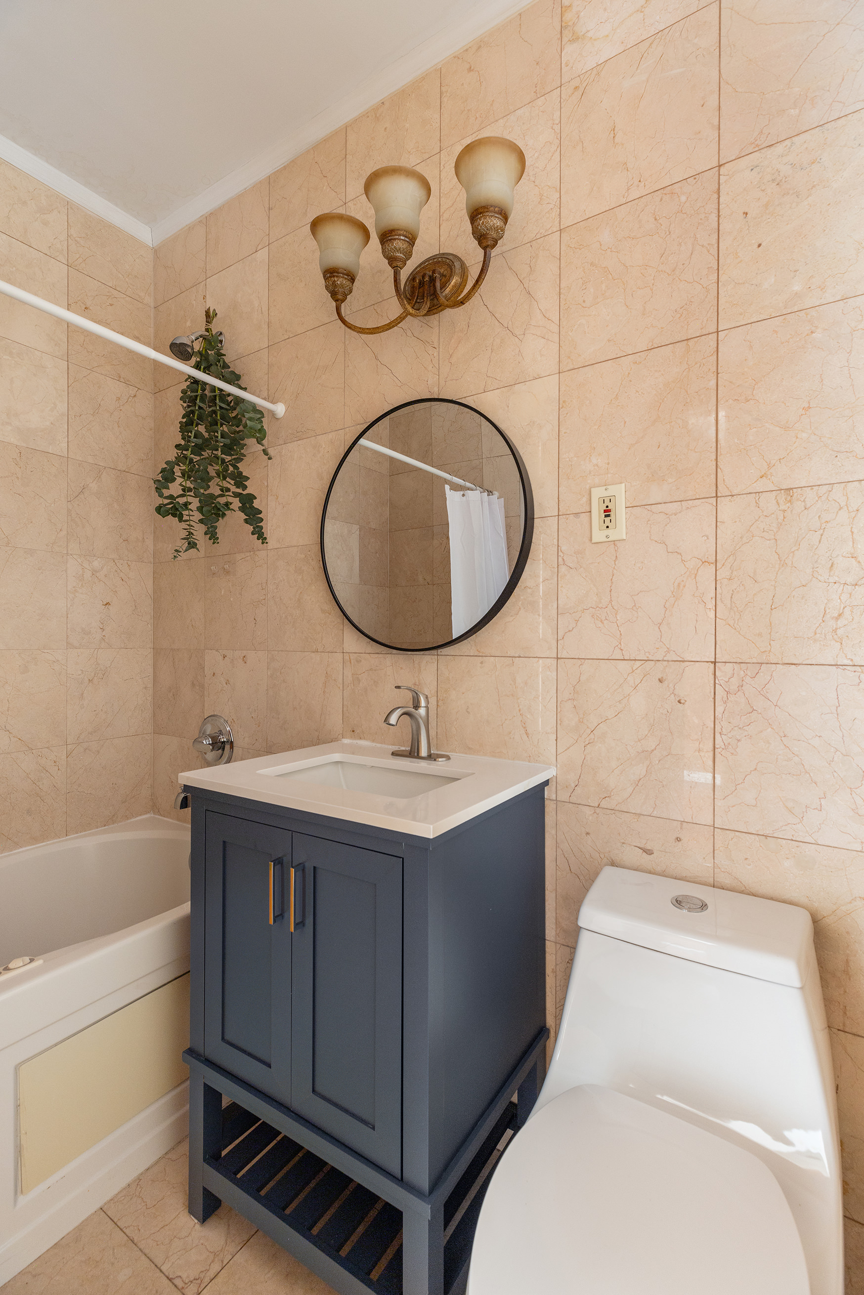 37 Quincy Street Brooklyn, NY 11238 - Photo 7 of 24 a bathroom with a sink and a bathtub