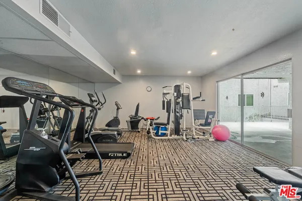 a view of a room with gym equipment