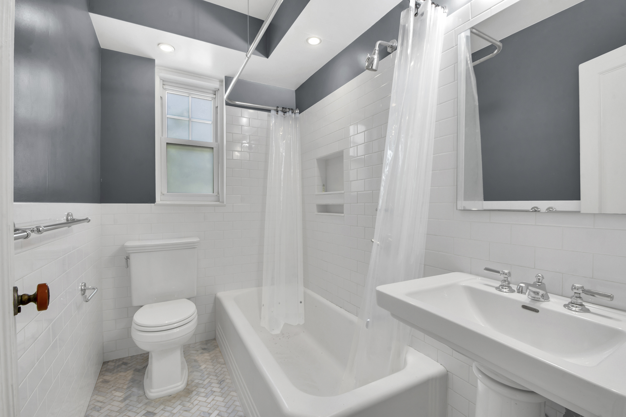 140 Cabrini Boulevard, Unit 14 Manhattan, NY 10033 - Photo 11 of 30 a bathroom with a sink toilet tub and shower