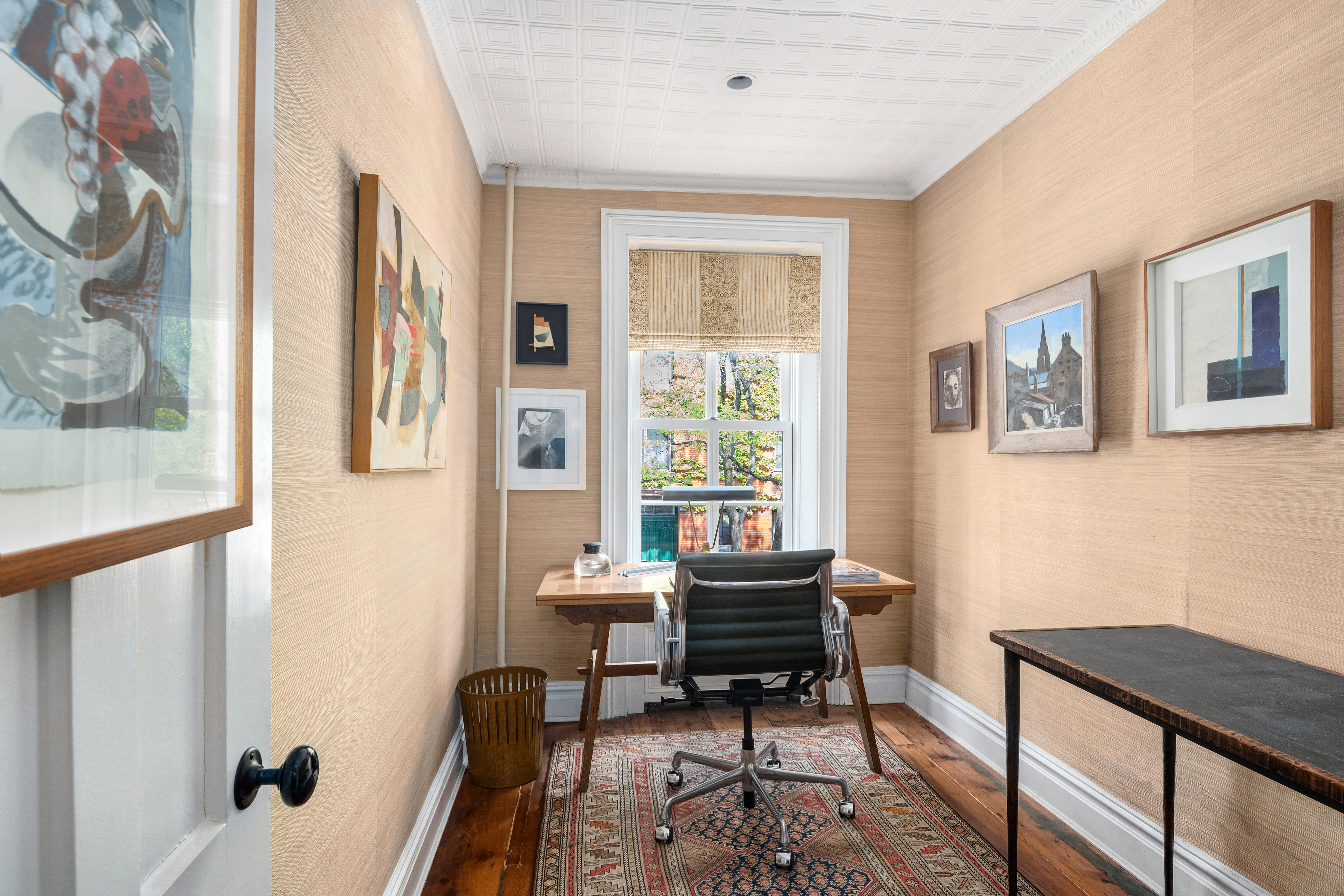 204 Warren Street Brooklyn, NY 11201 - Photo 12 of 29 a workspace with furniture and a window