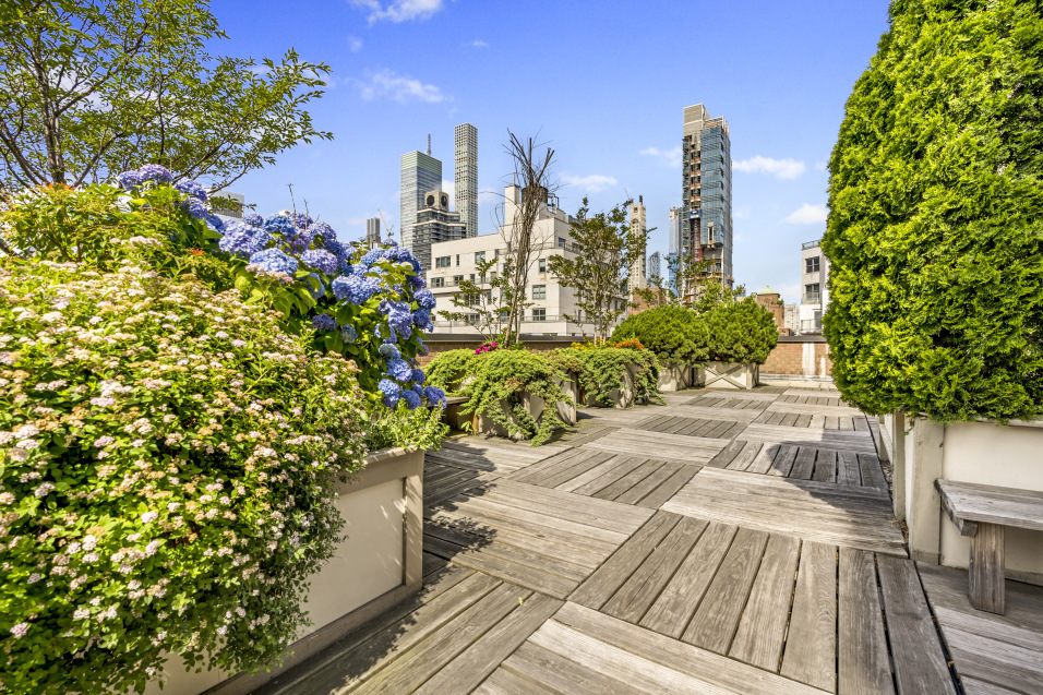 301 East 22nd Street, Unit 11U Manhattan, NY 10010 - Photo 8 of 11 a view of a city with flower plants