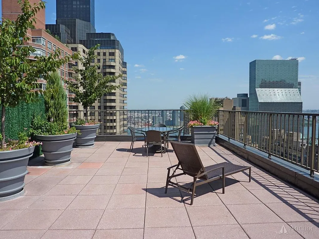 212 East 47th Street, Unit 6B Manhattan, NY 10017 - Photo 10 of 11 a view of a terrace with chairs