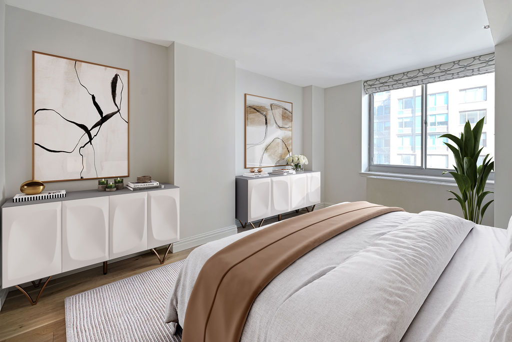 520 West 23rd Street, Unit 8C Manhattan, NY 10011 - Photo 4 of 10 a bedroom with a bed and a window