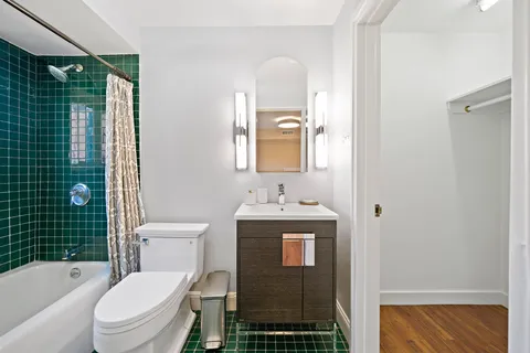 a front view of a house with a yard table and chairs