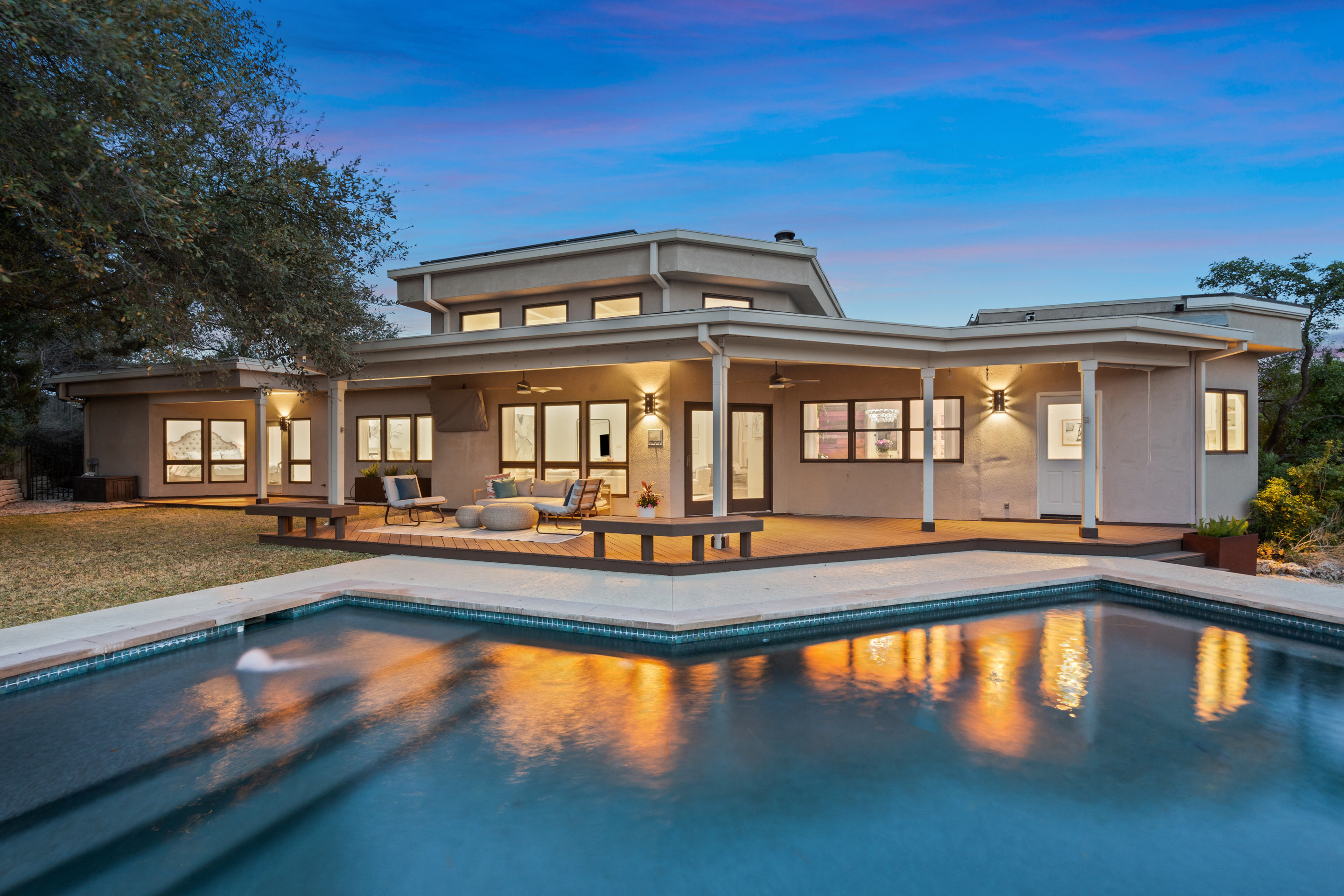 5319 Backtrail Drive Austin, TX 78731 - Photo 2 of 35 a view of a house with swimming pool and sitting area