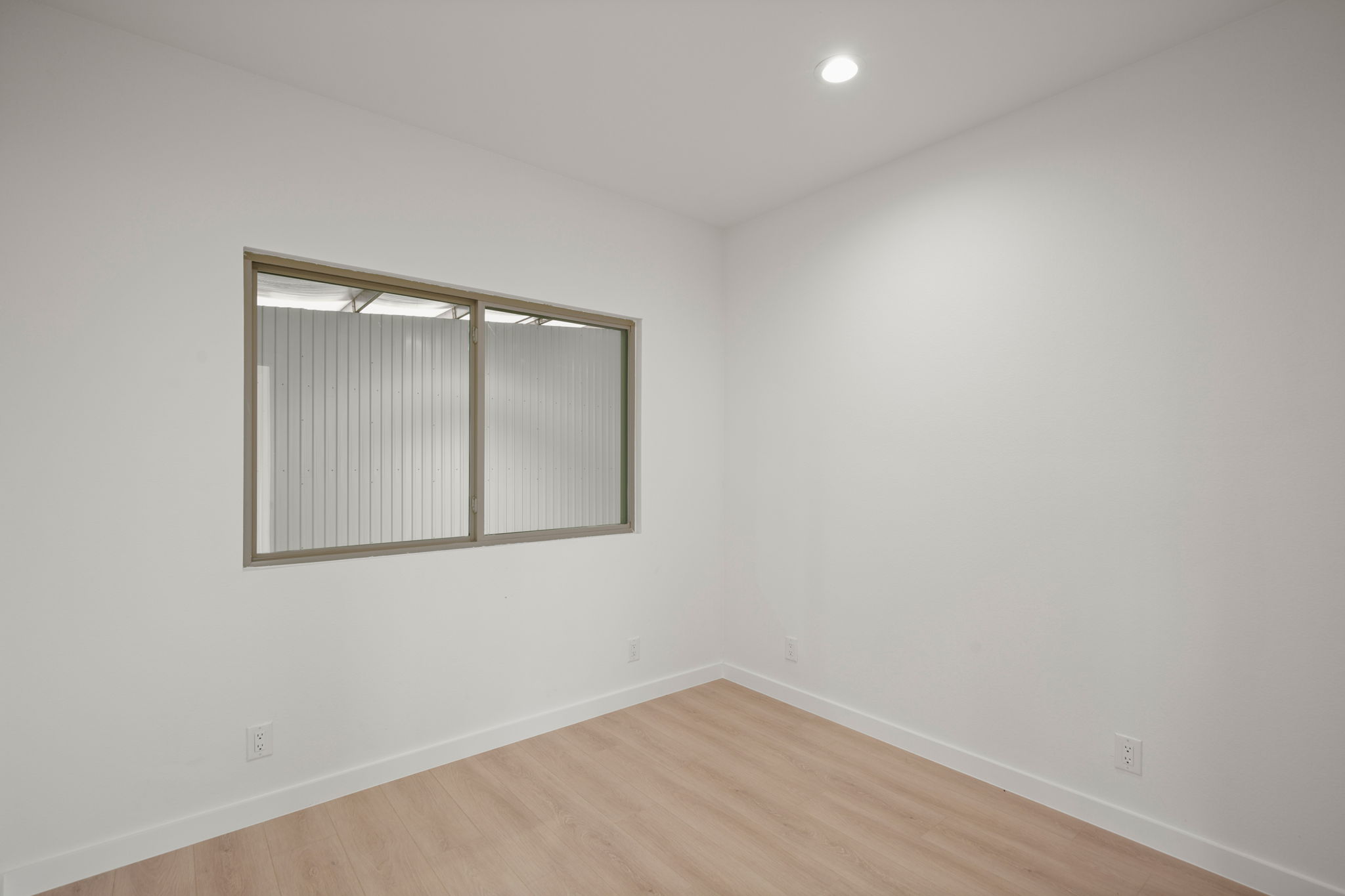 10020 Darden Hill Road, Unit 401 Austin, TX 78737 - Photo 26 of 50 an empty room with a window