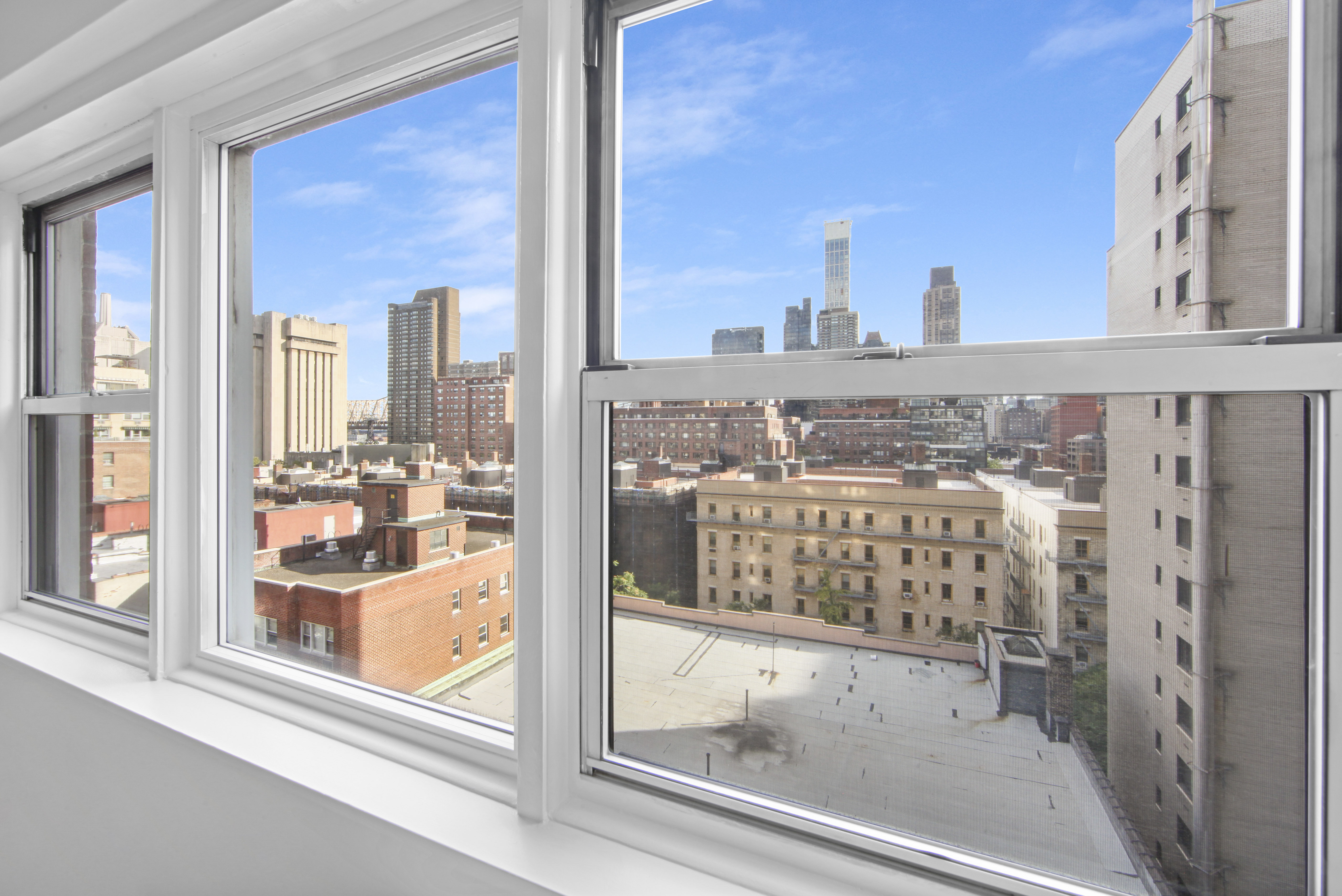 404 East 66th Street, Unit 11B Manhattan, NY 10065 - Photo 3 of 9 a bathroom with a bathtub and a shower