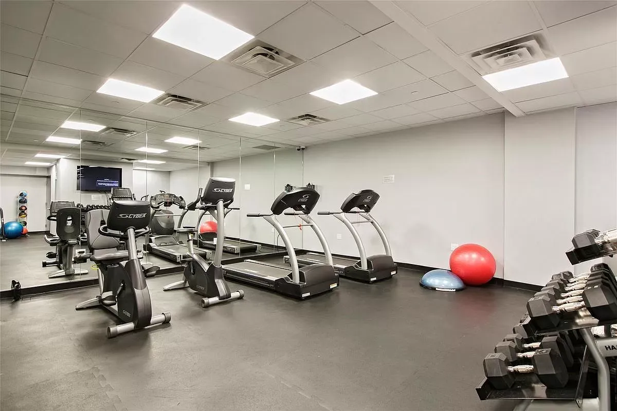 a view of a room with gym equipment
