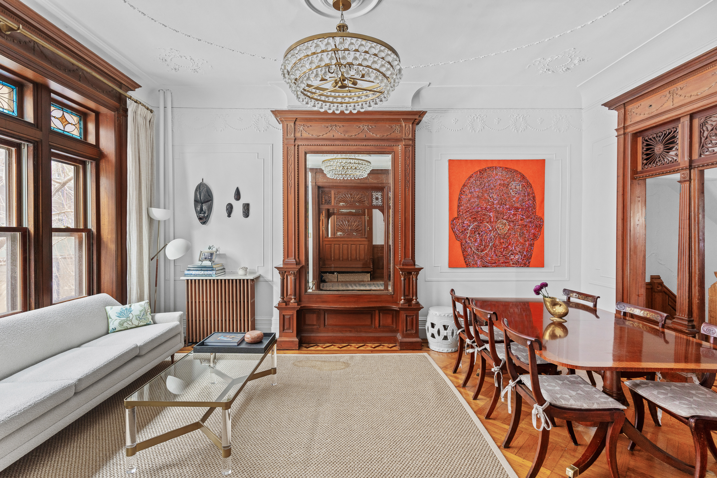 479 4th Street, Unit TRIPLEX Brooklyn, NY 11215 - Photo 1 of 17 a dining room with furniture a chandelier and wooden floor