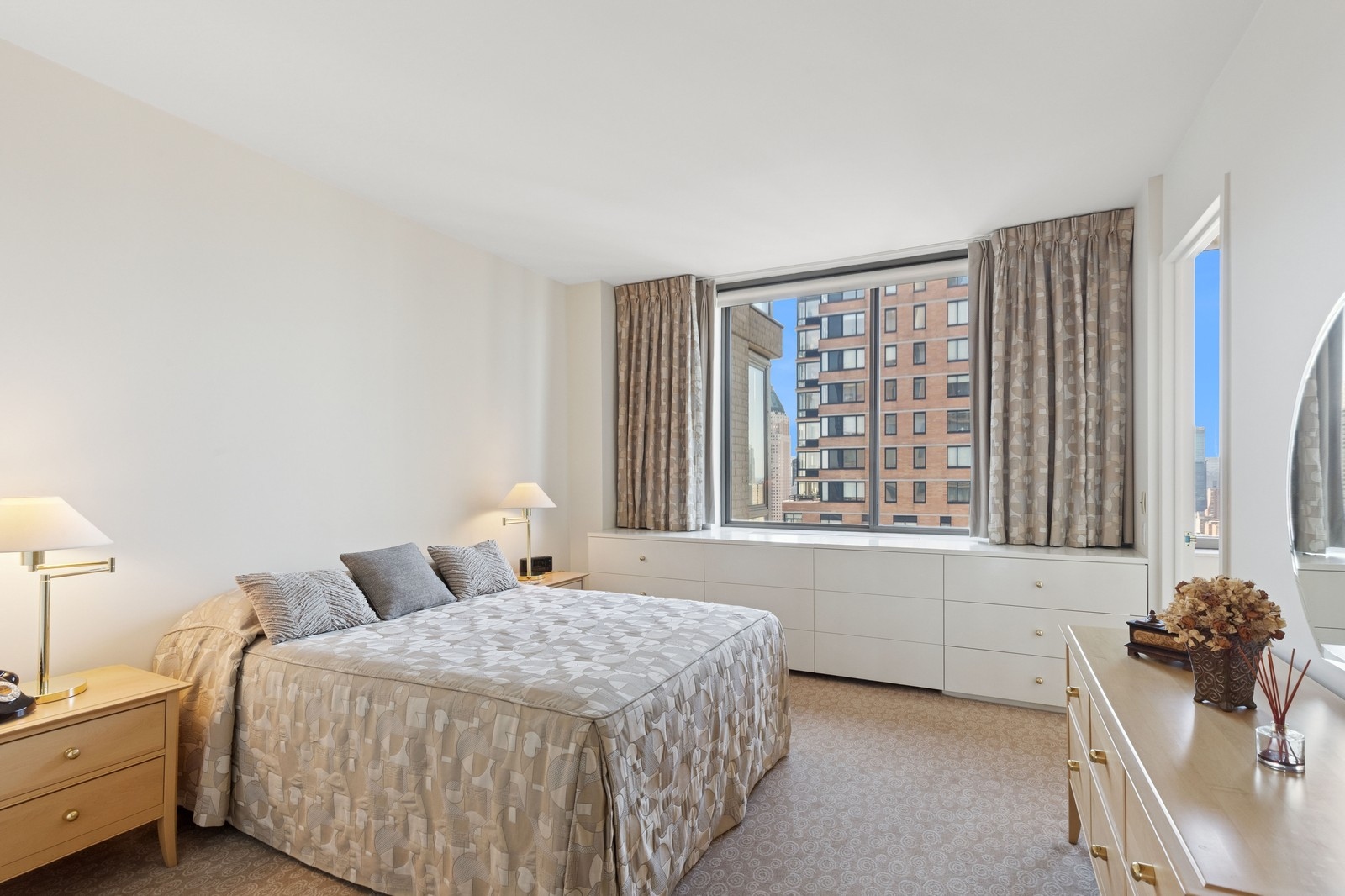 2 Columbus Avenue, Unit 35A Manhattan, NY 10023 - Photo 8 of 13 a bedroom with a bed and a window